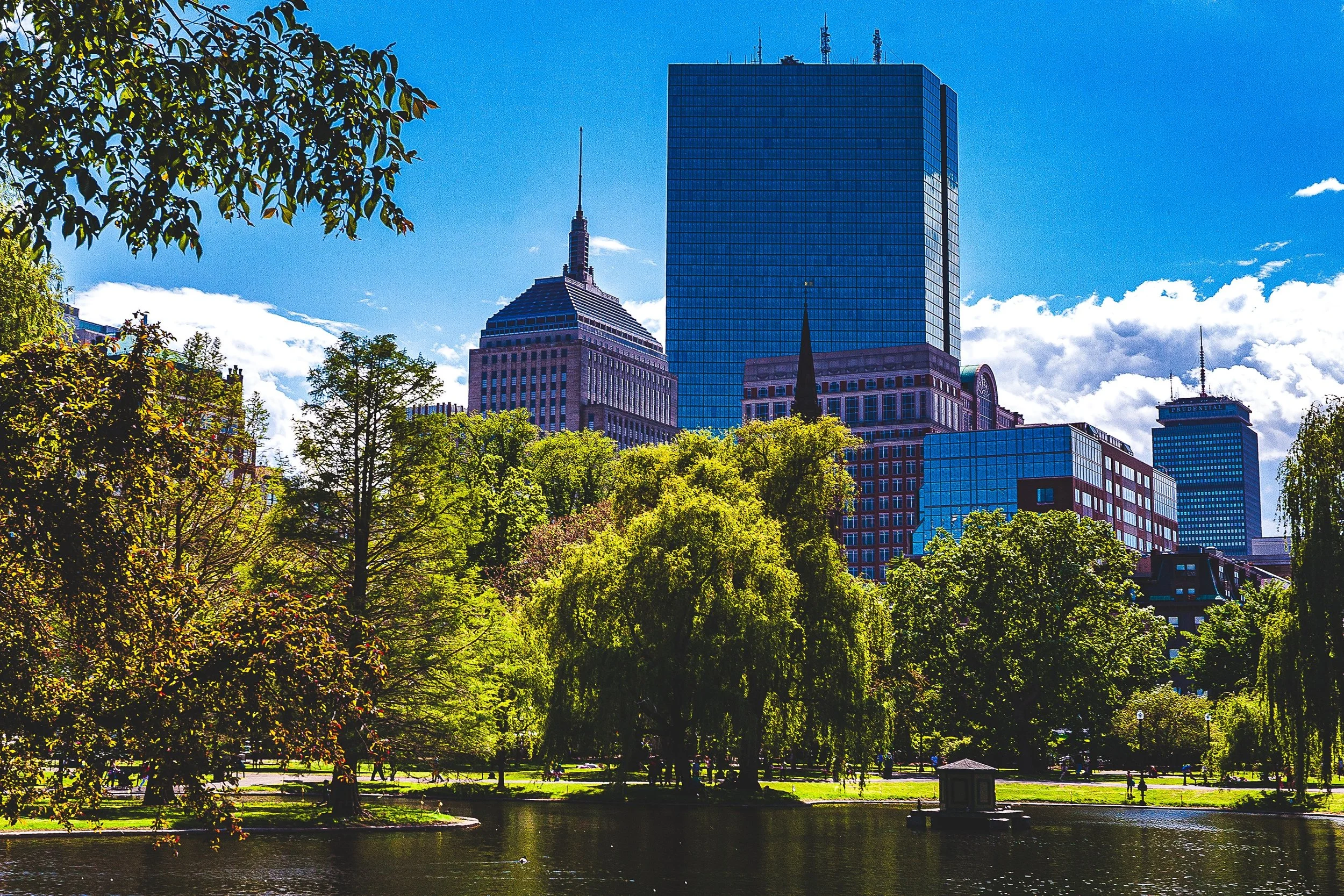 Detail crop from Parkside Geometry, emphasizing reflections and smaller historic forms appear between the dominant towers