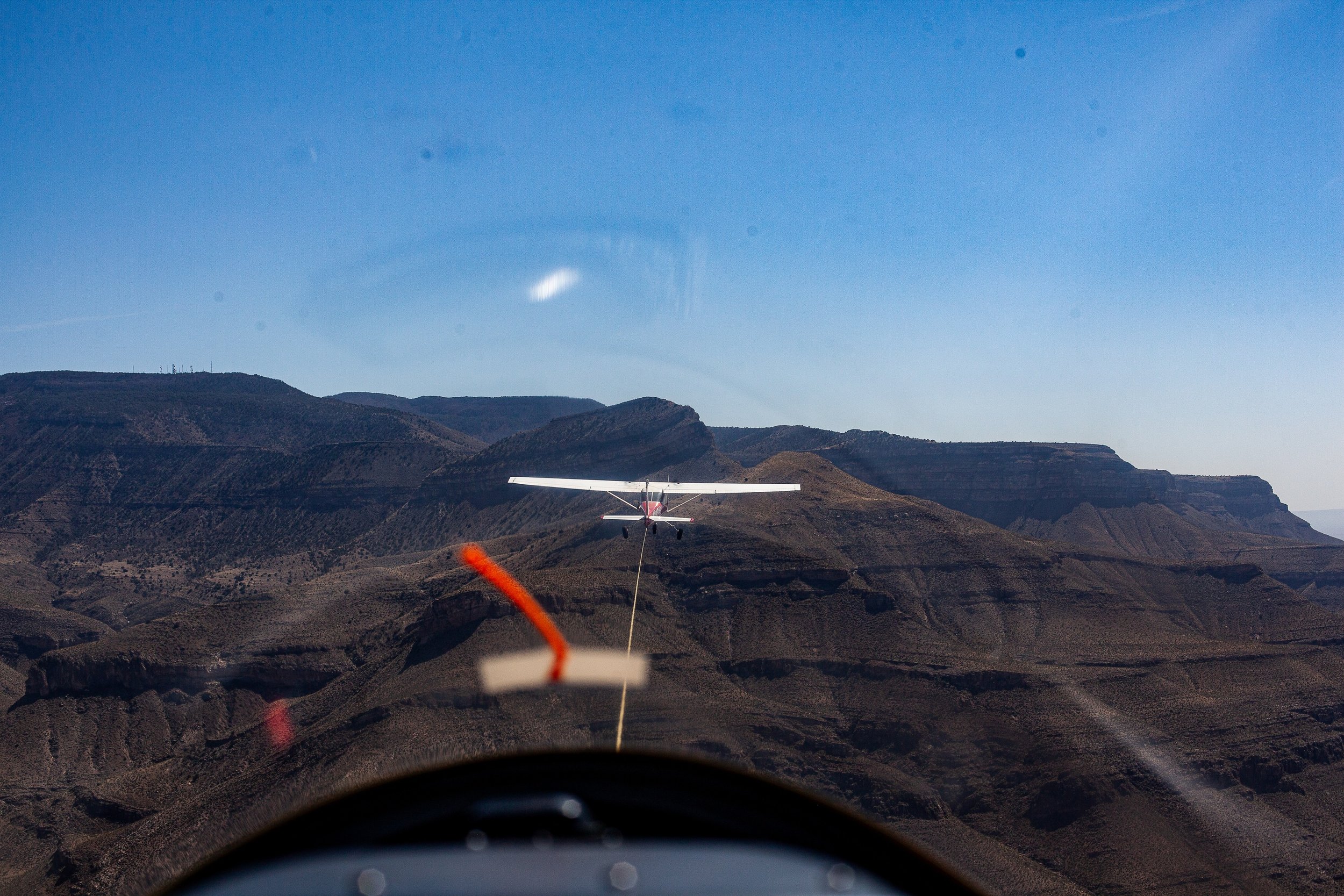 Complete uncropped artwork for Final Approach, showing a small airplane aligns with a runway beyond the cockpit of another aircraft