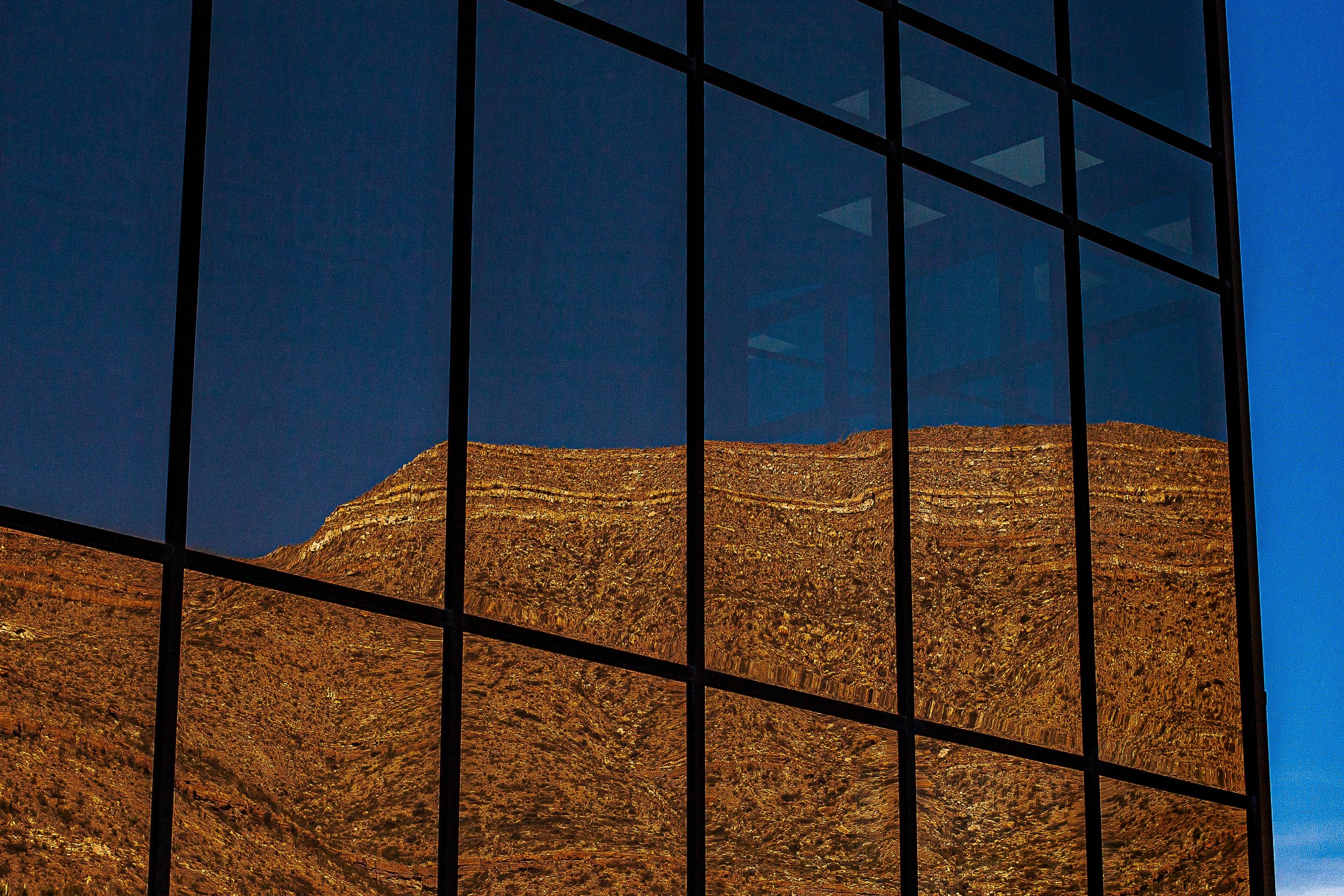 Detail crop from Borrowed Mountain, emphasizing window seams fragment the slope into shifting architectural panels