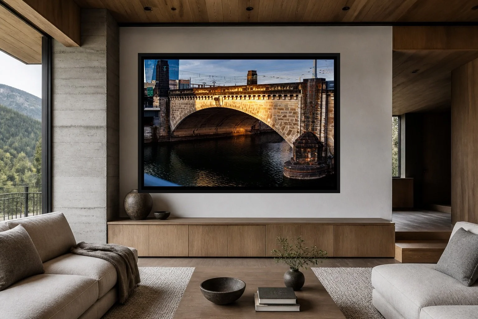 Stone Crossing displayed in a black frame within a contemporary mountain residence with board-formed concrete, oak, soft neutral upholstery, and a clear central wall