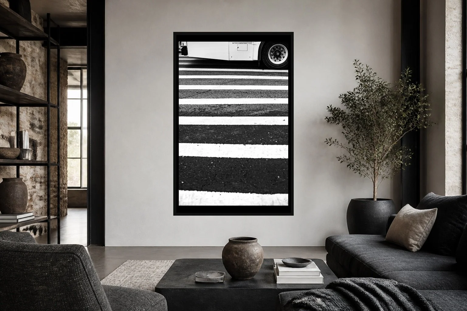 Crossing Lines displayed in a black frame within a modern collector's loft with white plaster, blackened steel, textured fabrics, and a clear central wall