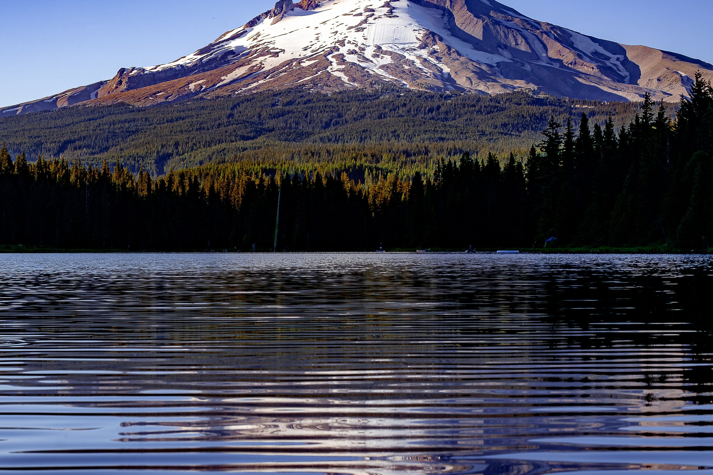 Detail crop from Mountain in Reflection, emphasizing small ripples break the lower form into changing bands of light
