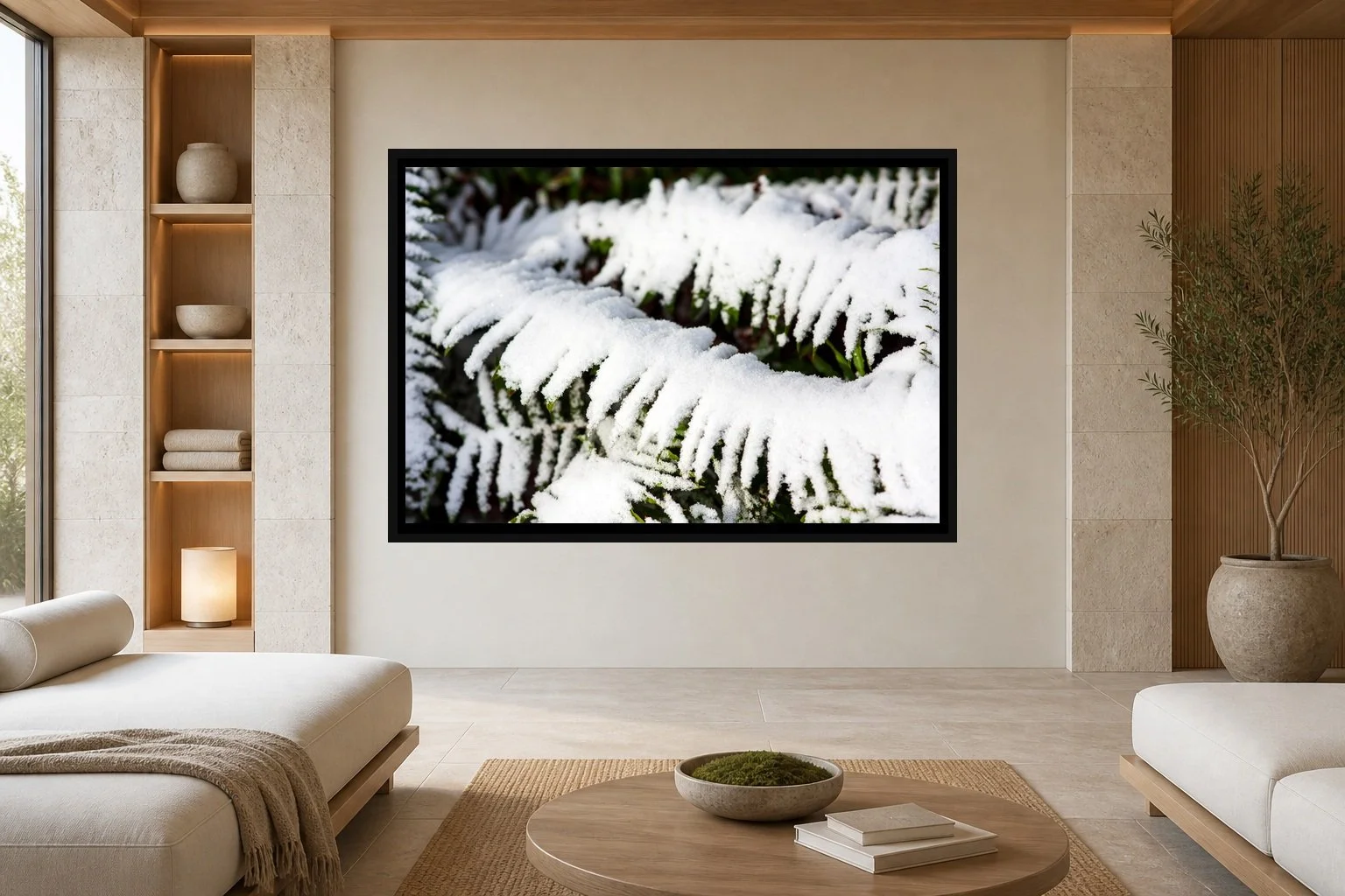 Winter Ferns displayed in a black frame within a luxury spa lounge with limestone, light ash wood, low cream seating, and a clear central wall