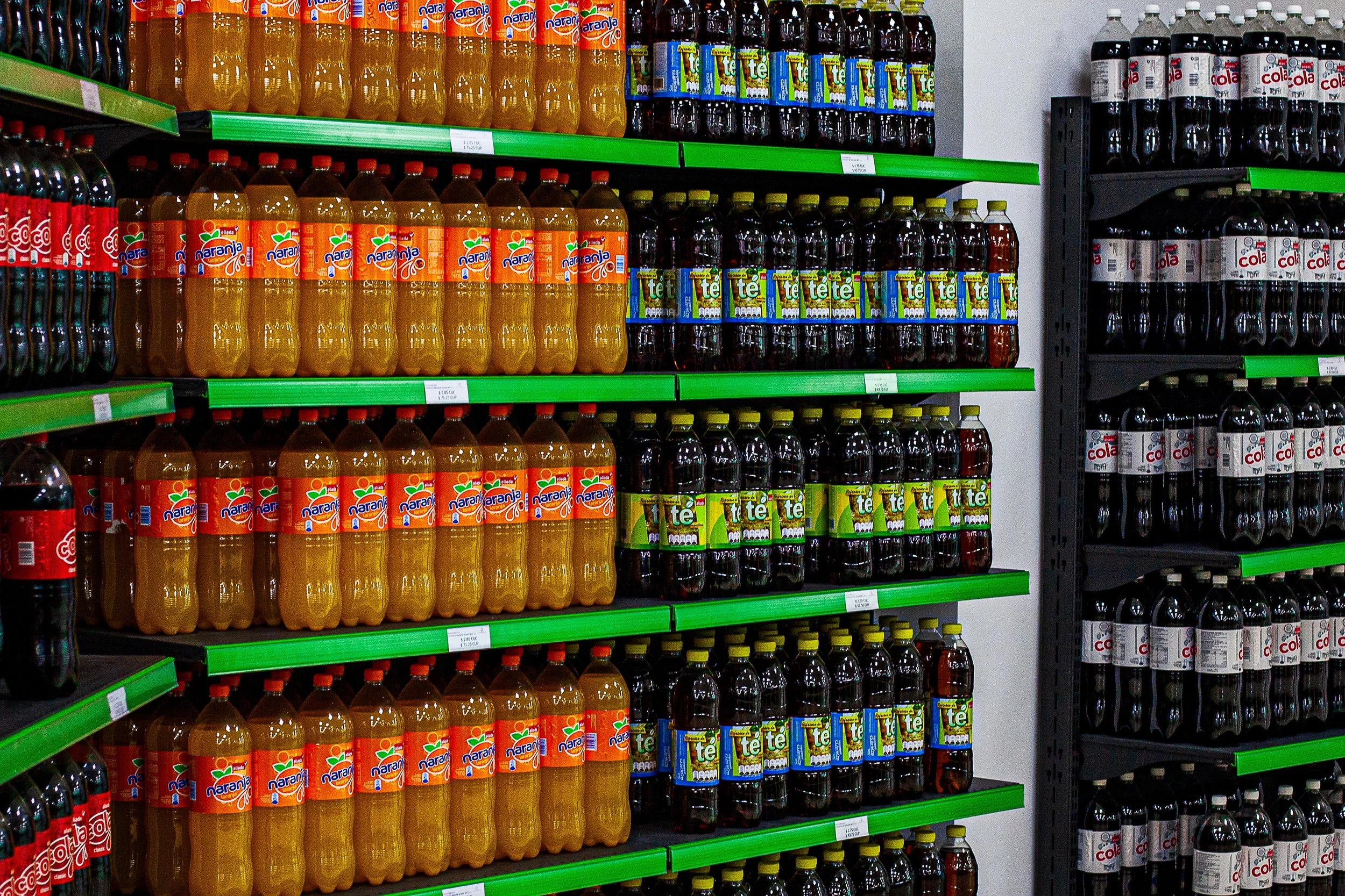 Detail crop from Bottled Color, emphasizing labels and liquid tones create subtle differences across the larger pattern
