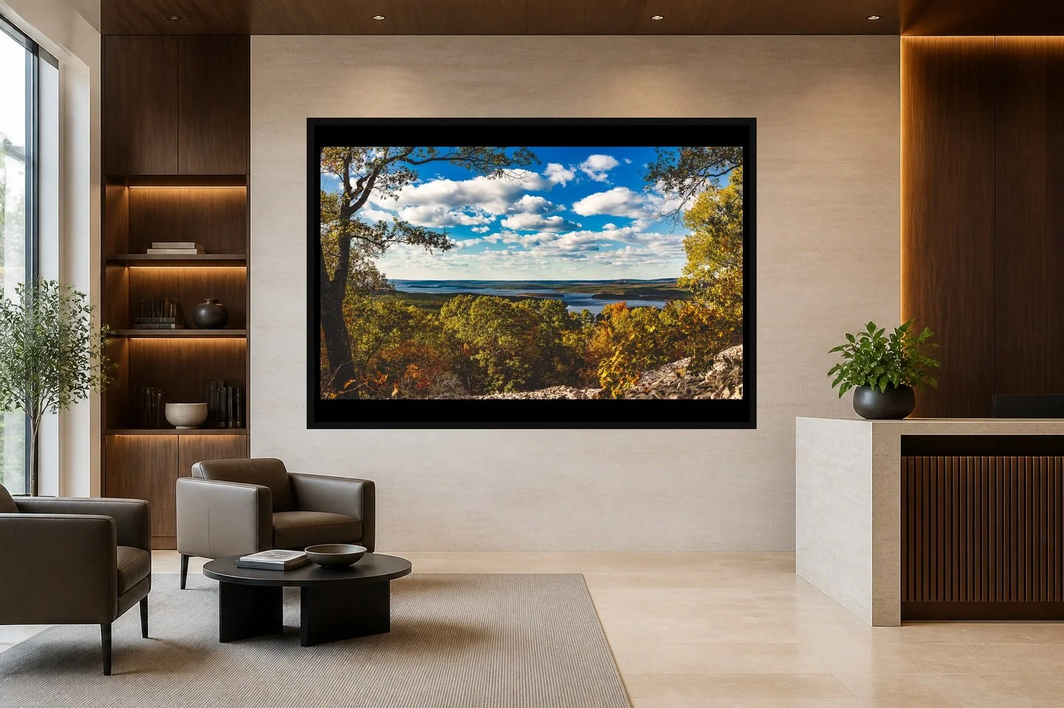 Autumn Lookout displayed in a black frame within an upscale law-office reception area with honed stone, walnut paneling, quiet seating, and a clear central wall