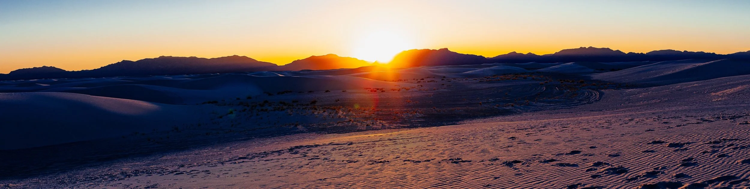 Detail crop from White Sand Dunes, emphasizing ridges and snow texture become more distinct as they recede from the sun