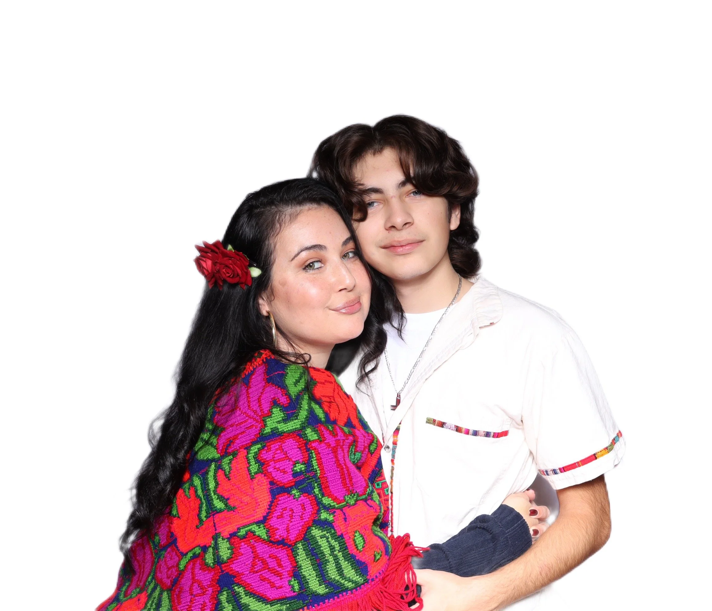 Mother and son posing with a side hug 