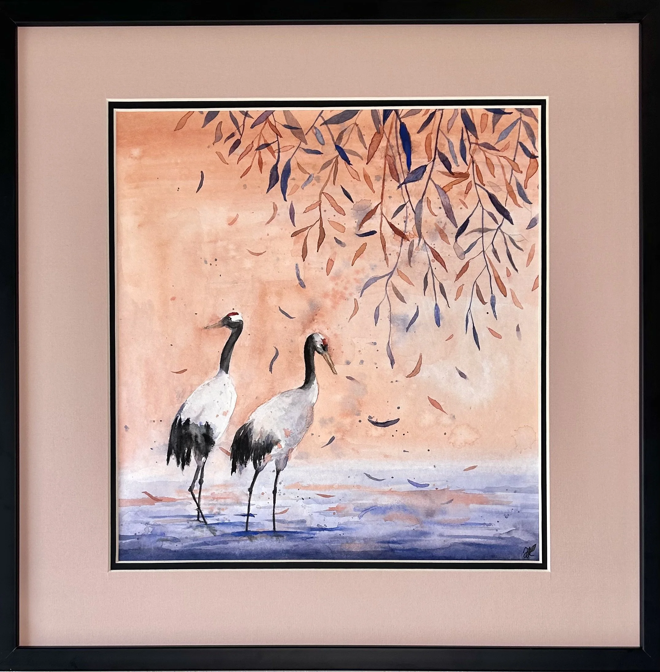 Cranes at sunset