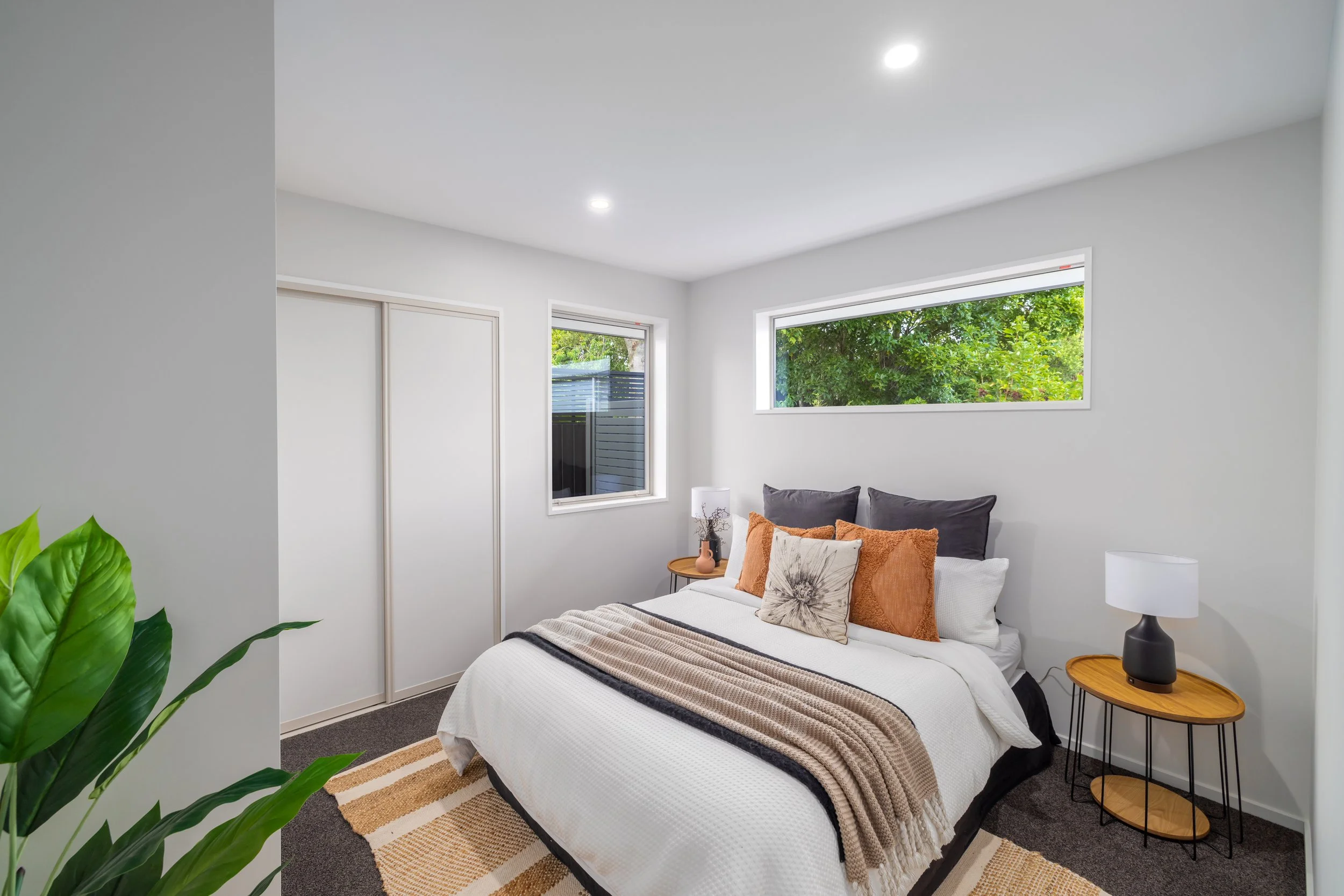 Modern bedroom in new build. Wardrobe sliders, blinds, downlights, ready for sale.