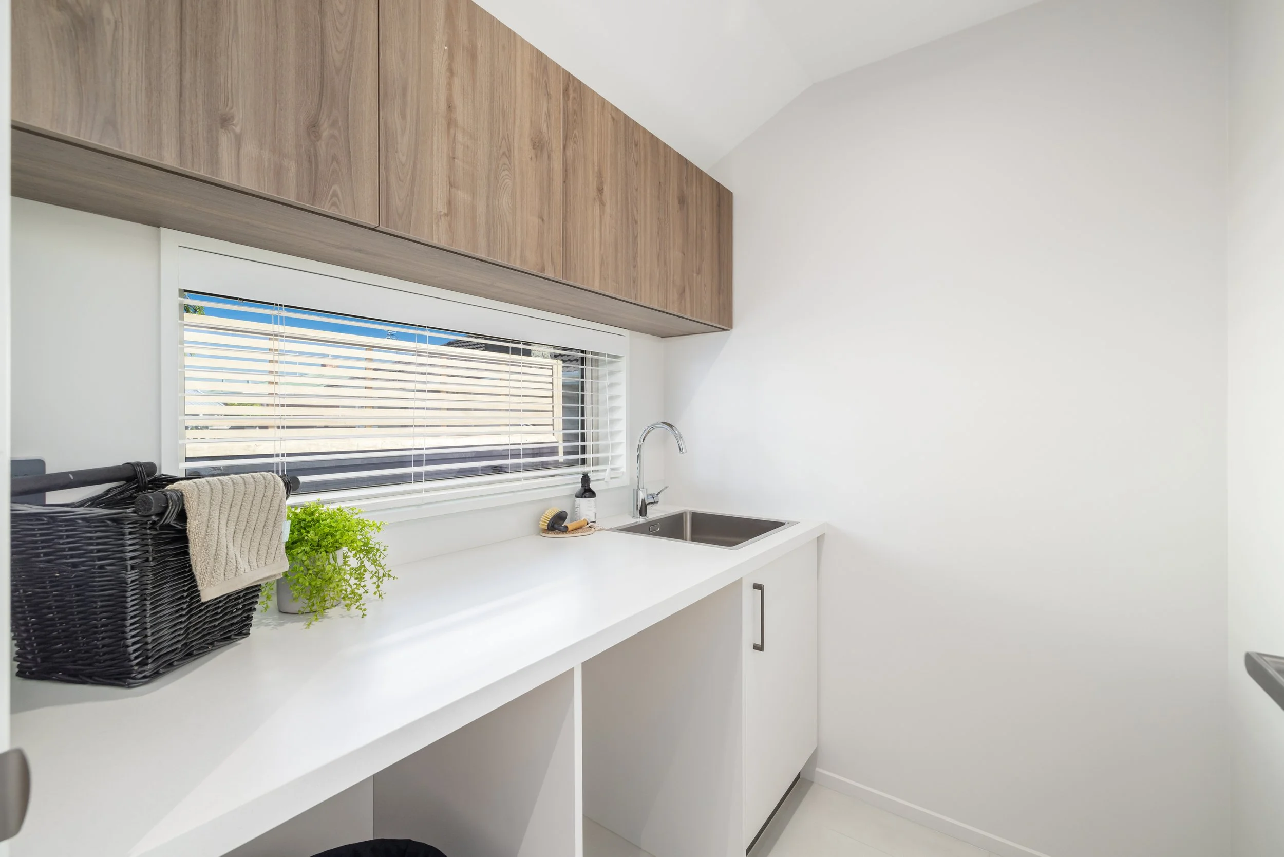 Modern butlers kitchen/laundry stone benchtop, new build, space utilisation