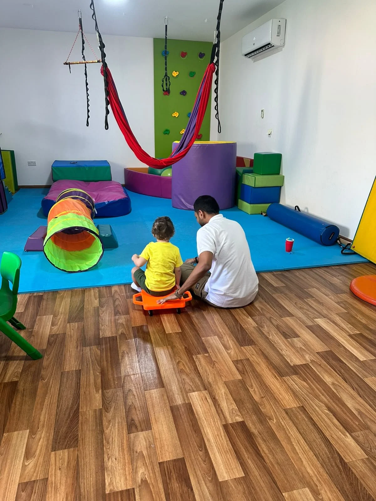 CDC occupational therapist working on motor skills.