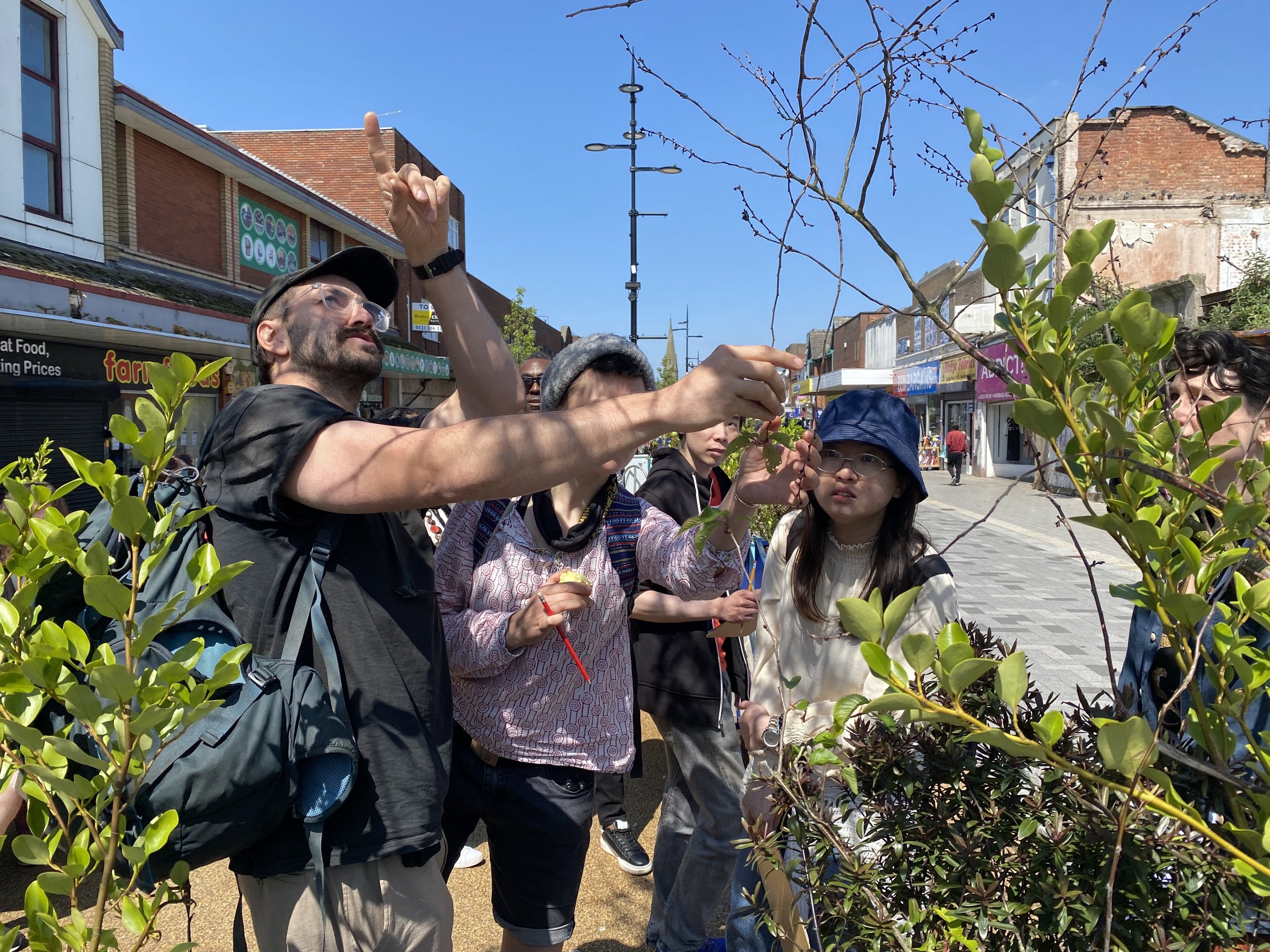 Becky Sexton has previously facilitated urban nature walks and this experience has influenced the design of the wildlife walks programme in Gather at the River Cole.
Guided walk along West Bromwich High Street © Kelly Hadley