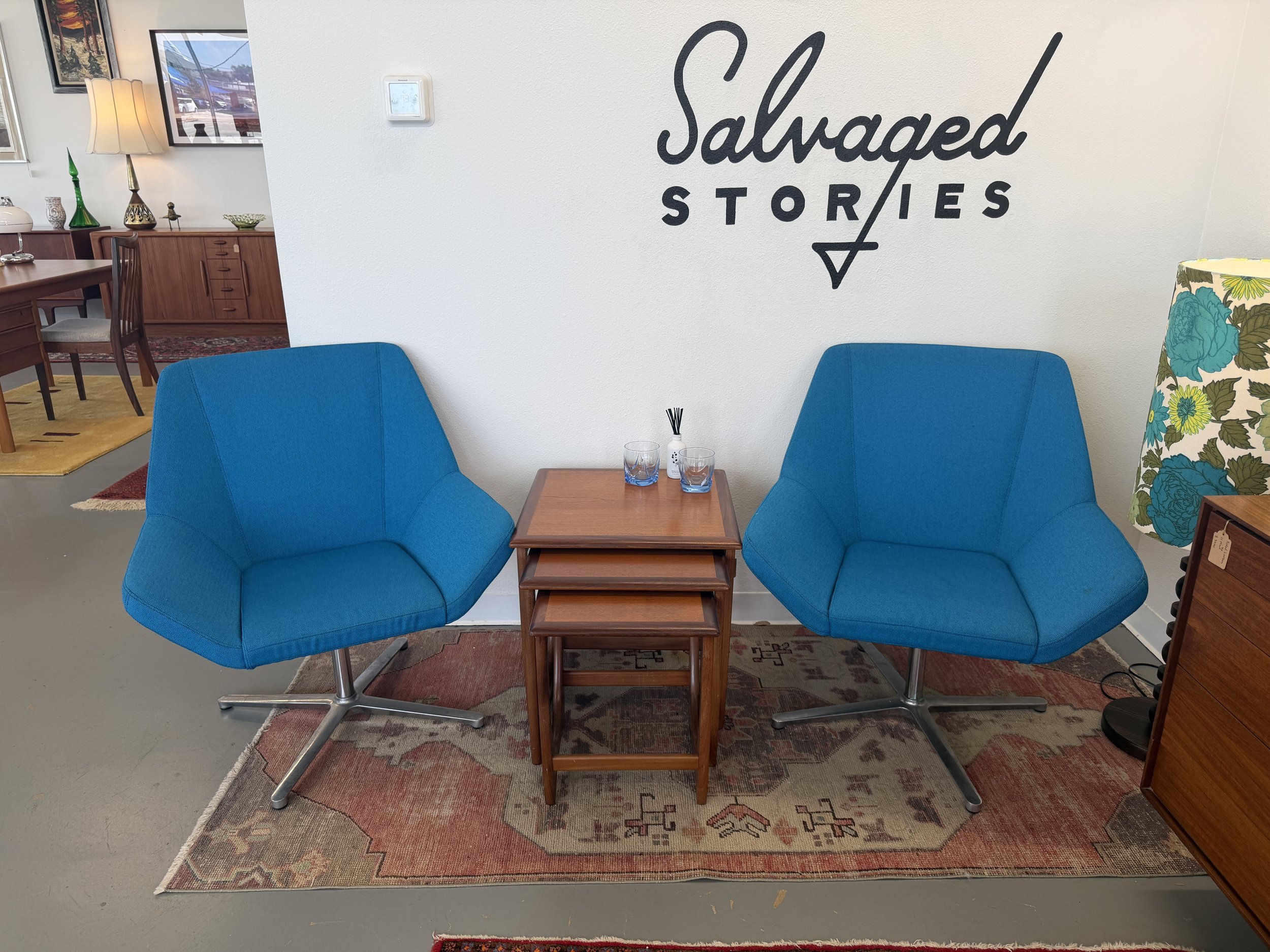 Pair of blue and chrome lounge chairs by Keilhauer