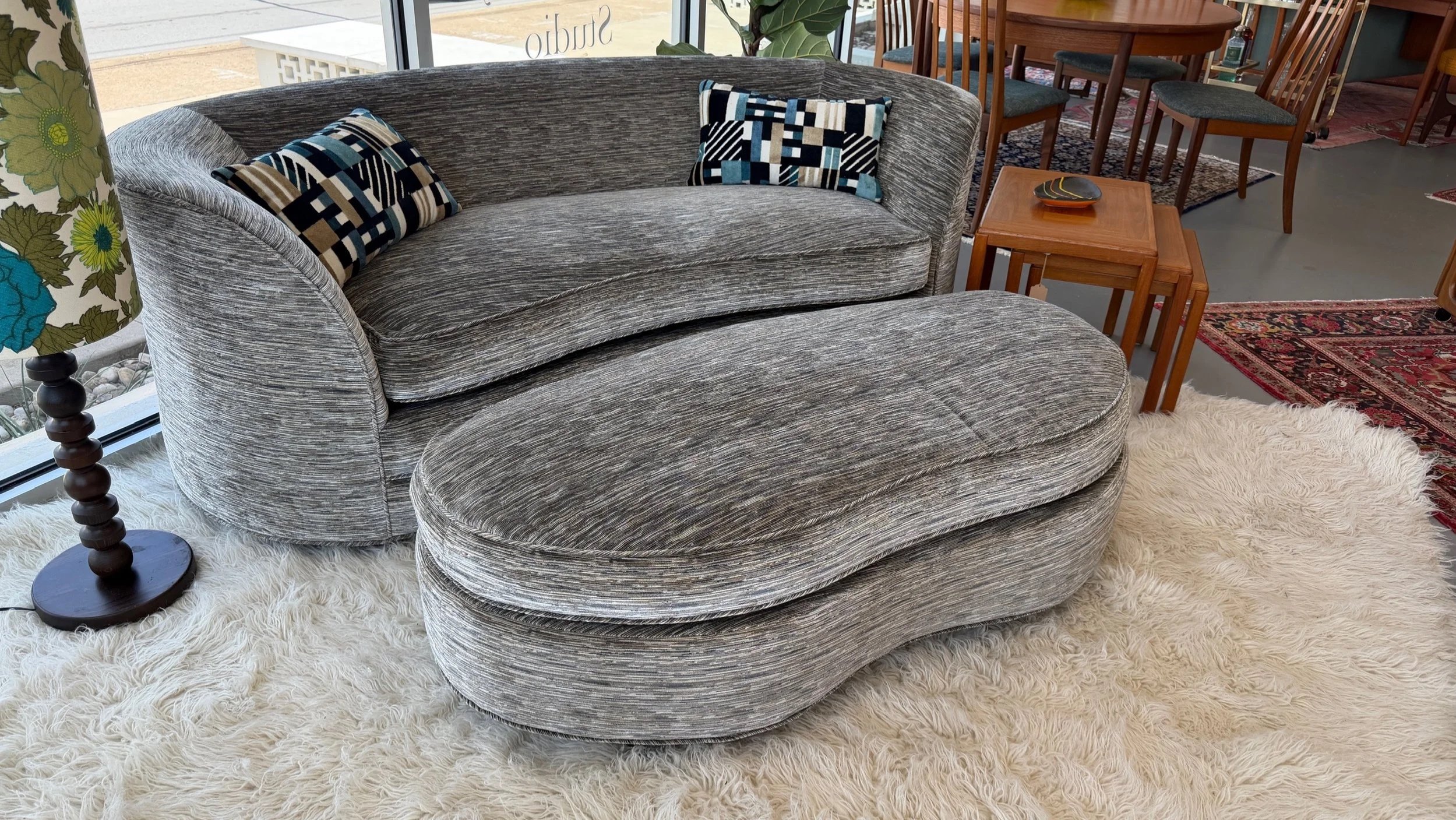 Luxurious grey sofa and ottoman