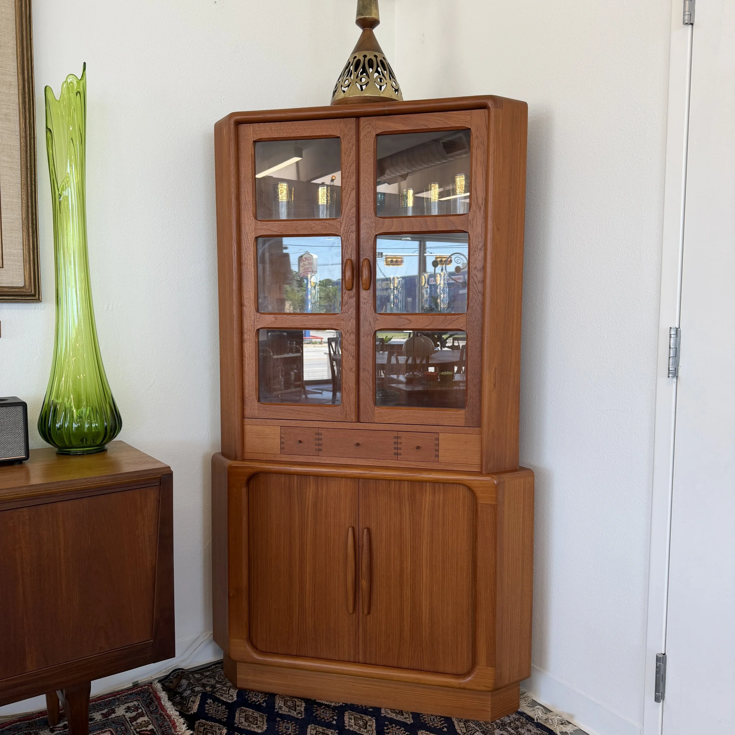 Dyrlund corner china cabinet with tambour doors and hidden drawer