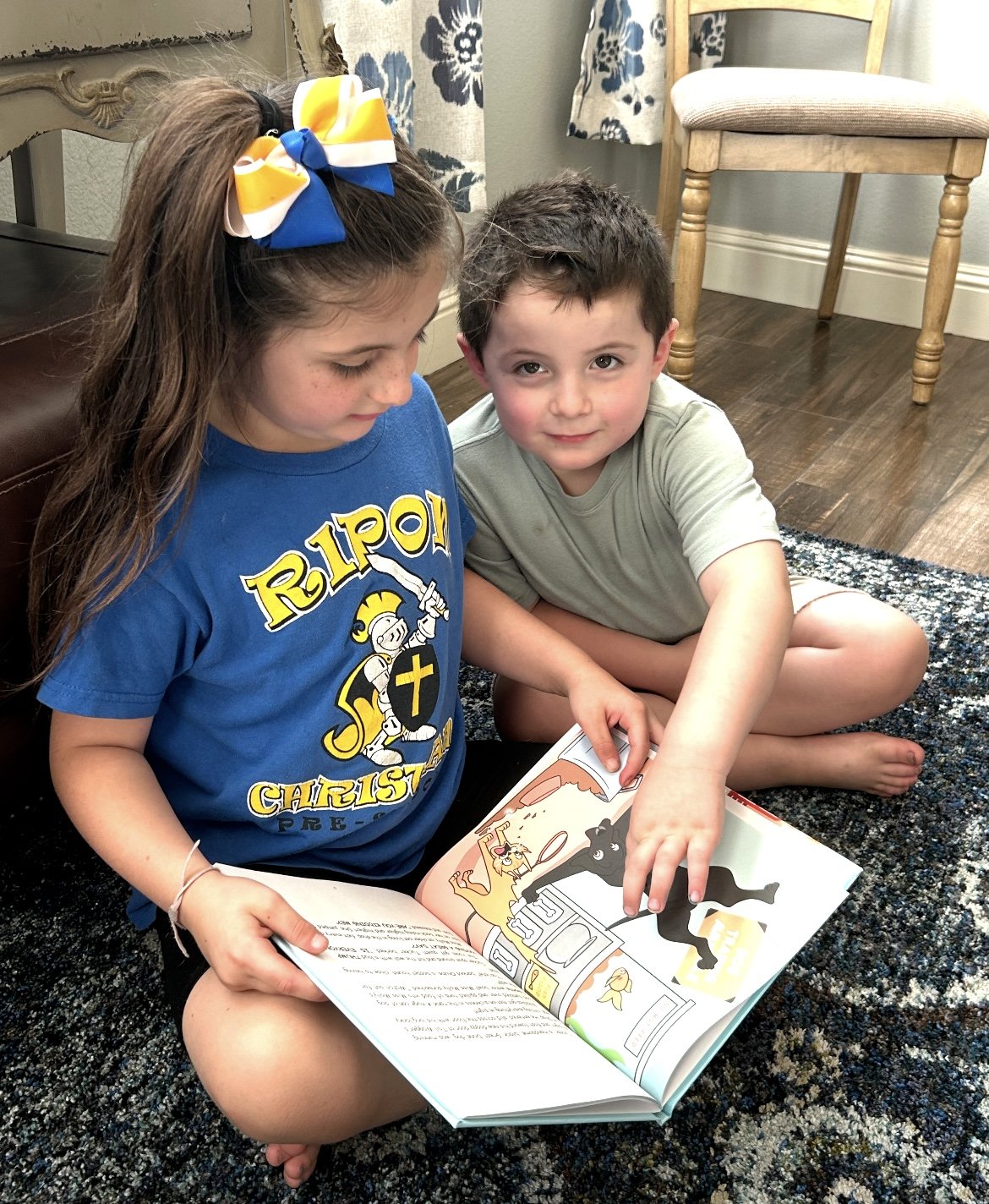 Zack and Sav with PLM book.jpg