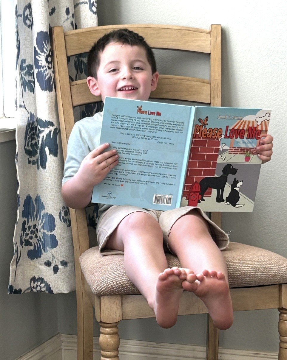 Zack with PLM book.jpg