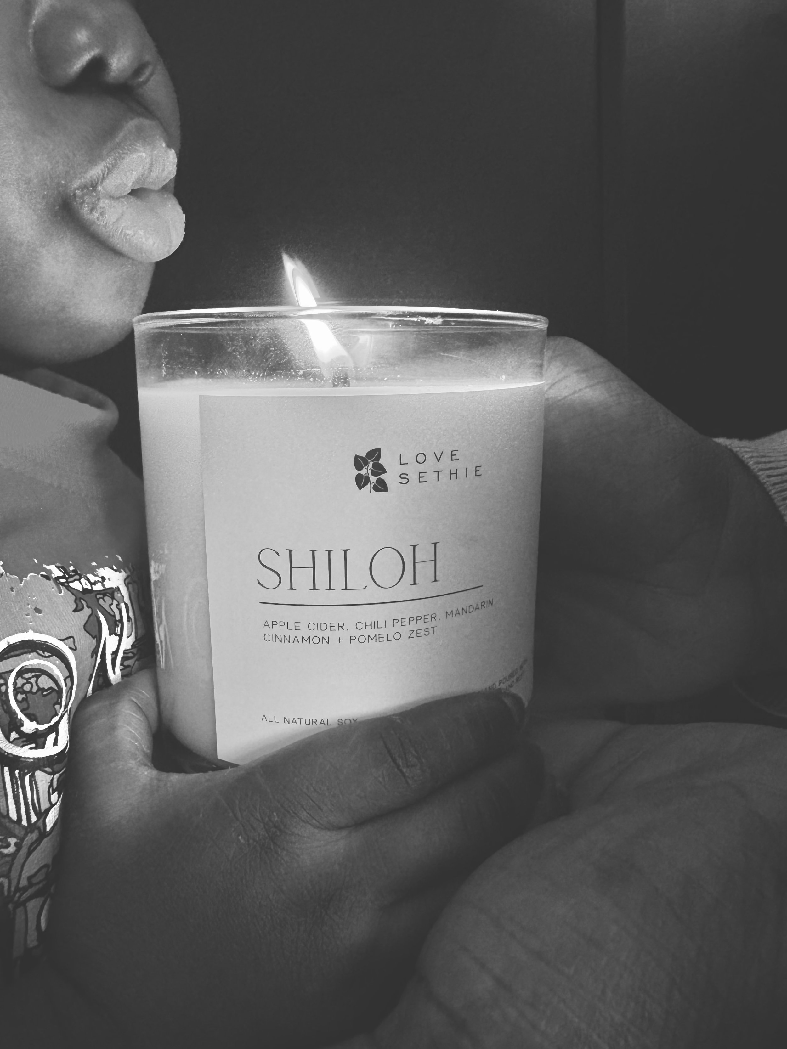 Shiloh blowing out candle