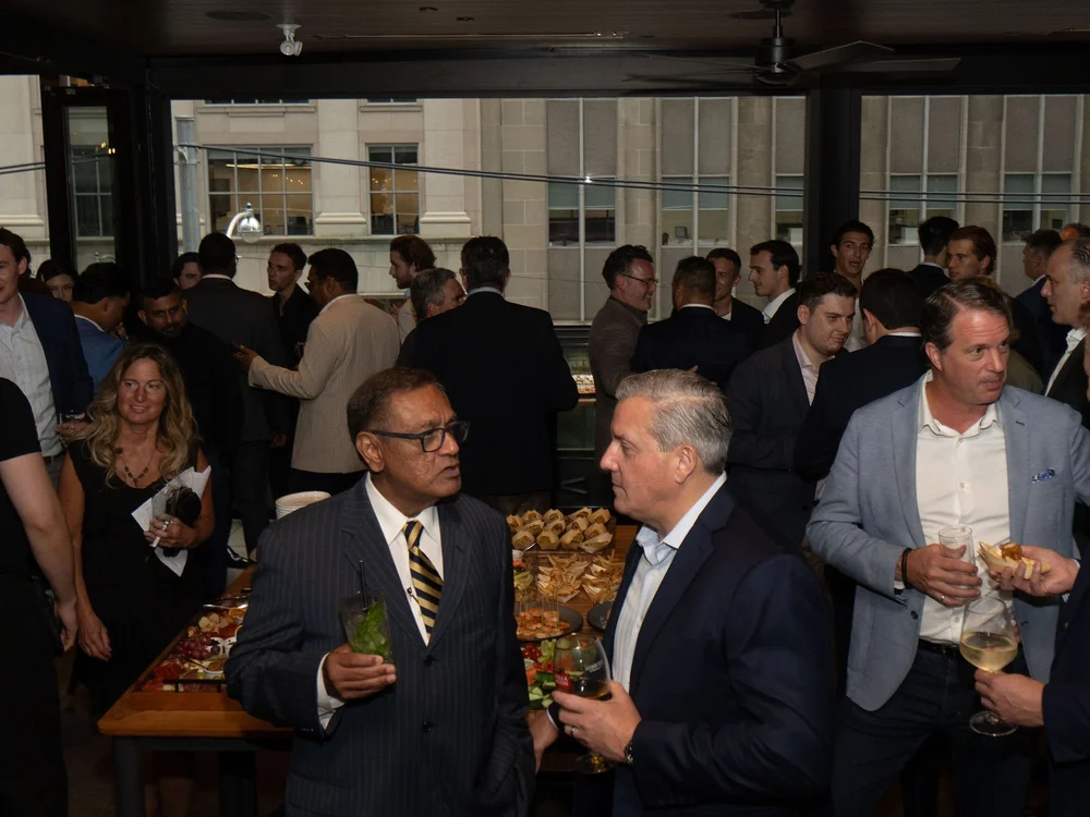 A full room at the evening cocktail reception