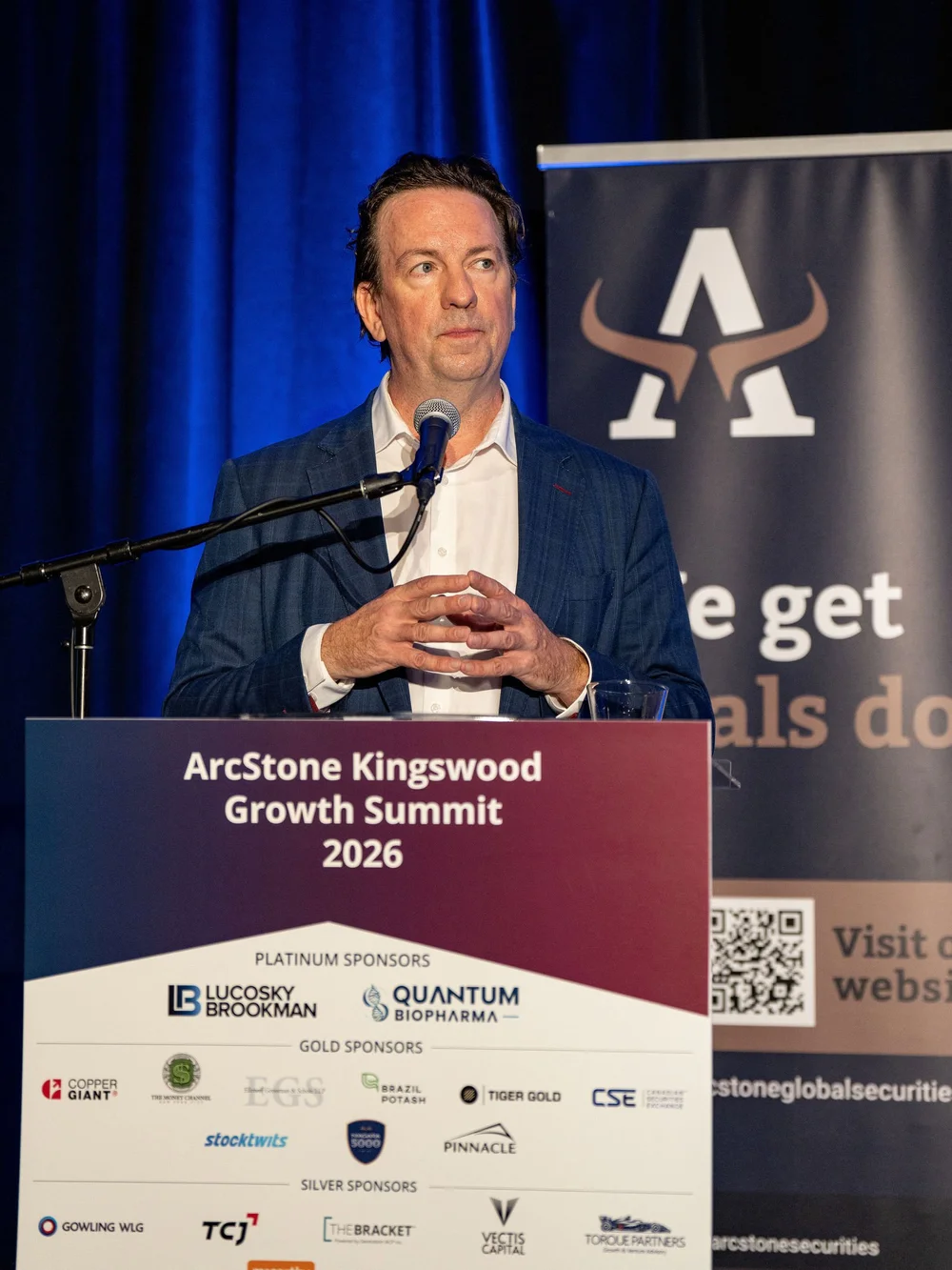 Speaker at the ArcStone Kingswood Growth Summit 2026 podium