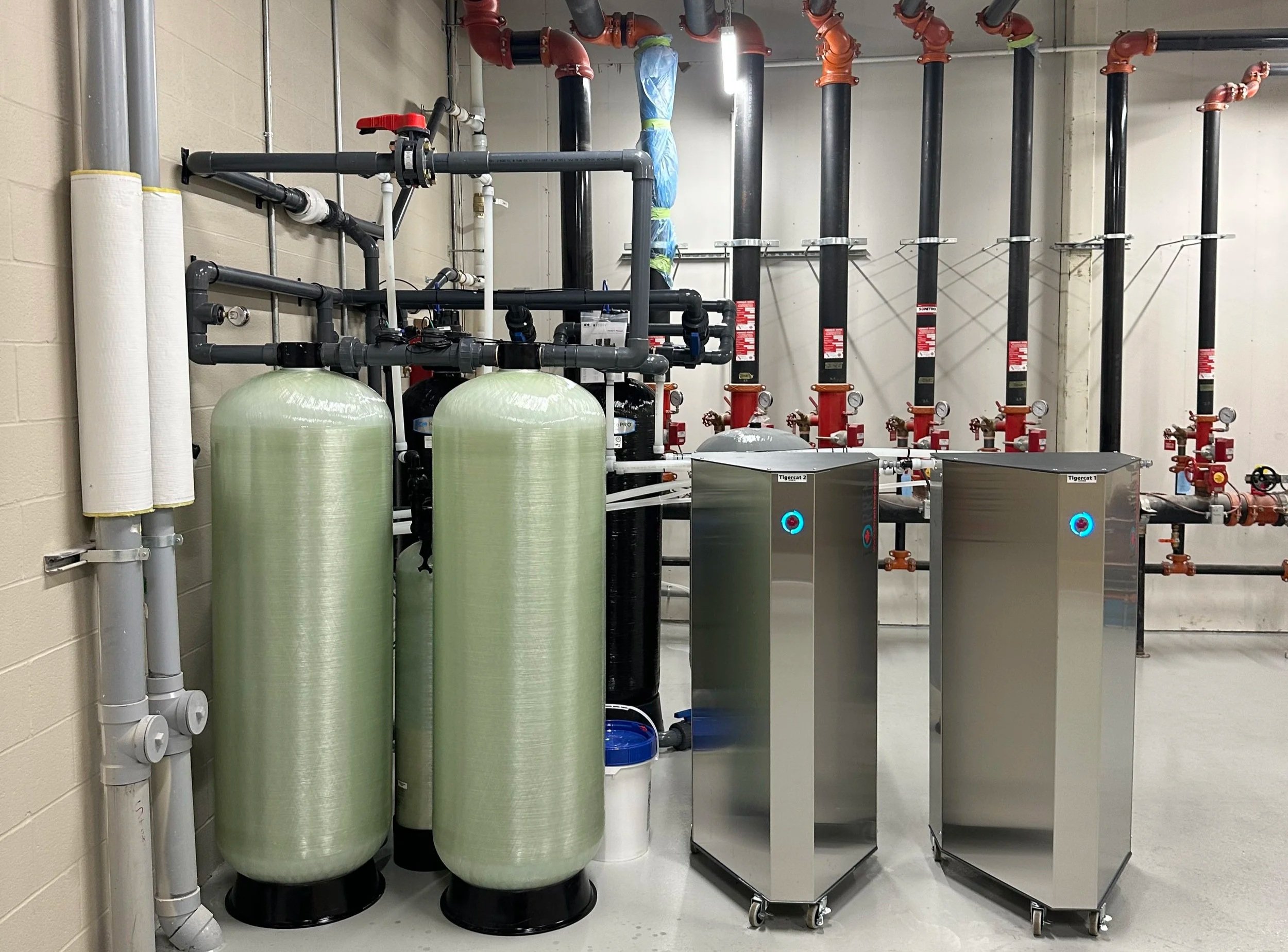An image of two Torrent 9000 series Commercial Water Softeners.
