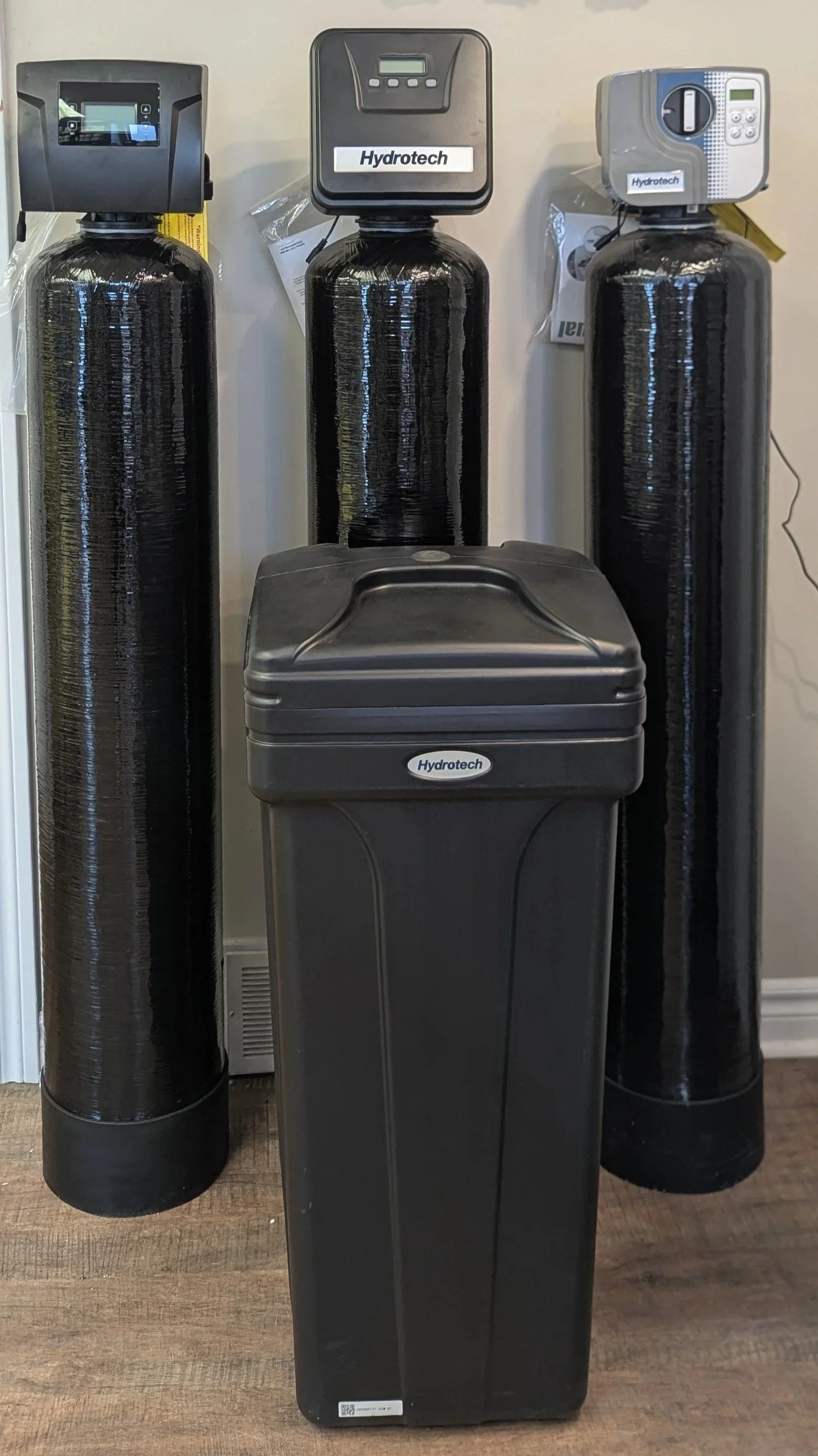 An image of Hydrotech Water Softeners and a Hydrotech Salt Tank on display in the 5 Star Water Solutions showroom.