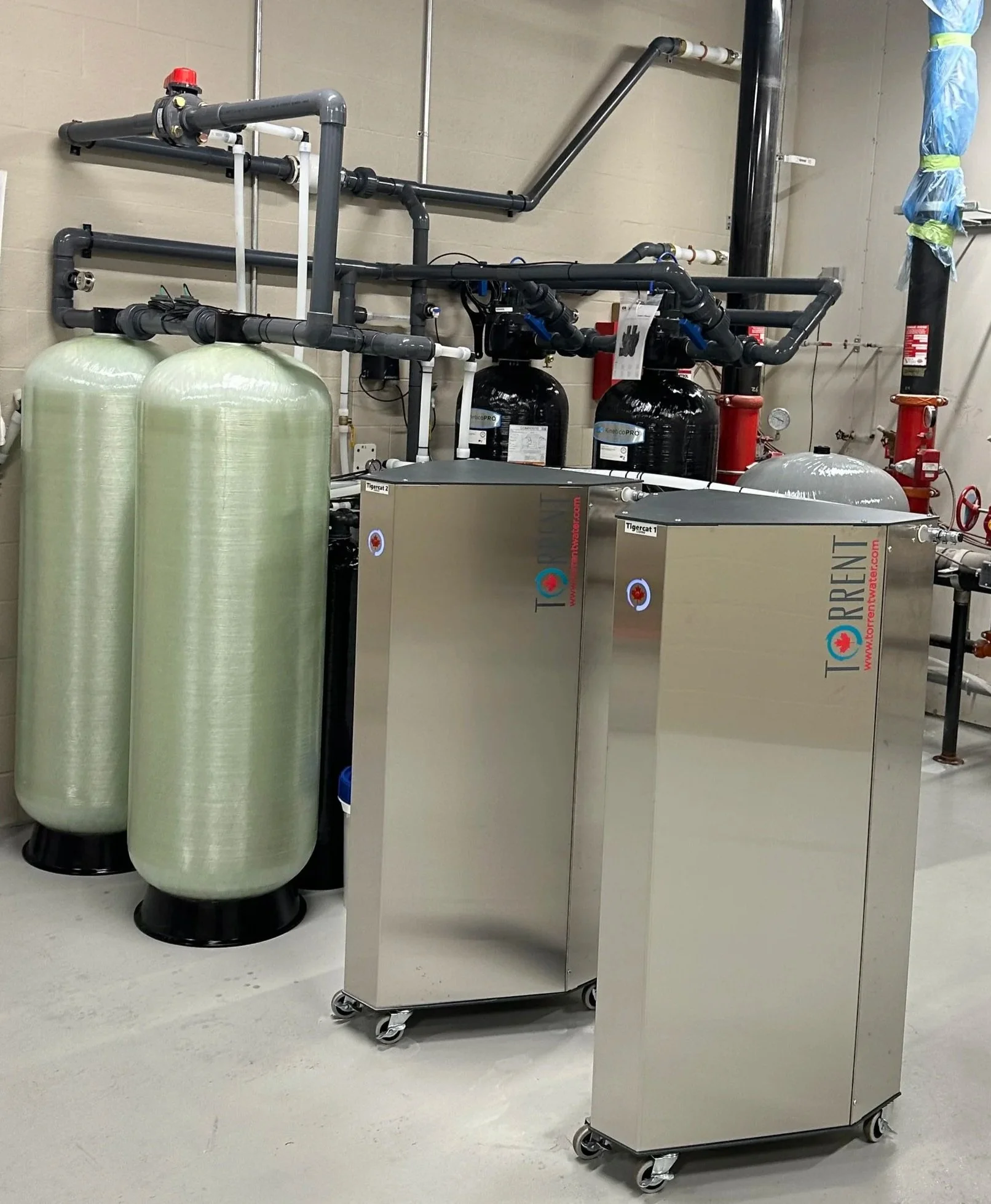 An image of two Torrent 9000 Commercial Water Softeners.