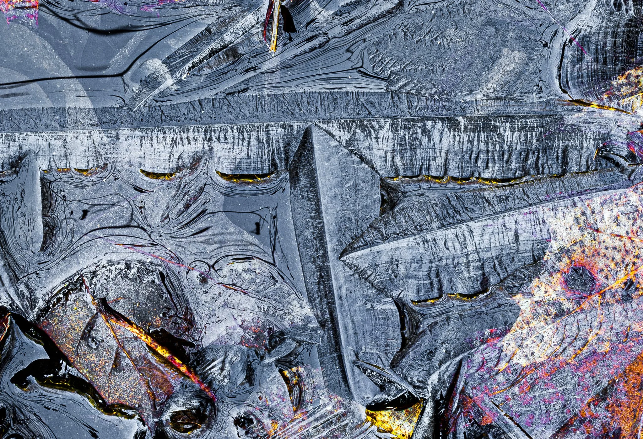 Franconia Twins, mid-April, 2025.  I found this ice in a small poll within an open field near Easton Road, Franconia, New Hampshire.