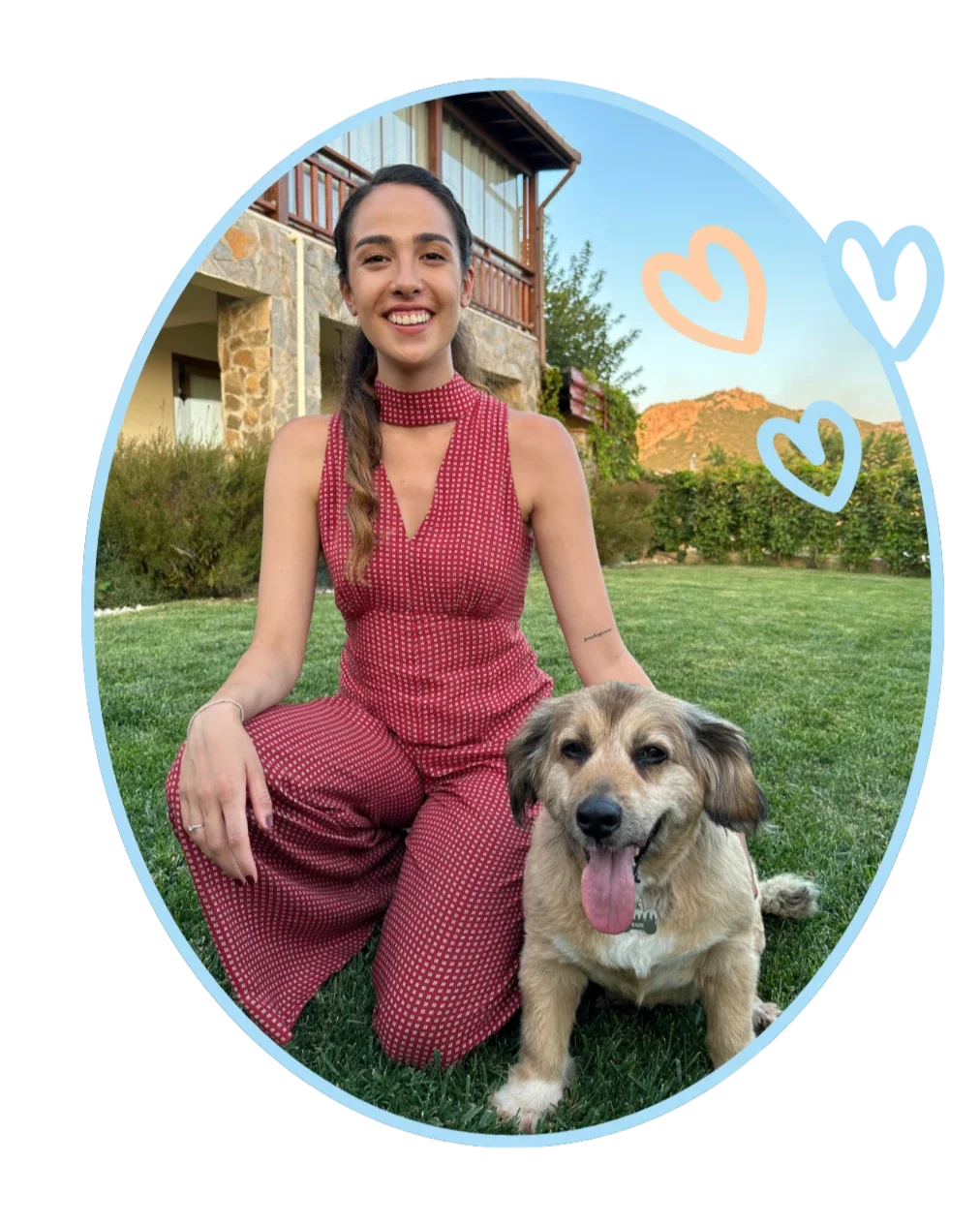 NYC dog trainer Sedef kneeling in a backyard with a tan medium-sized dog