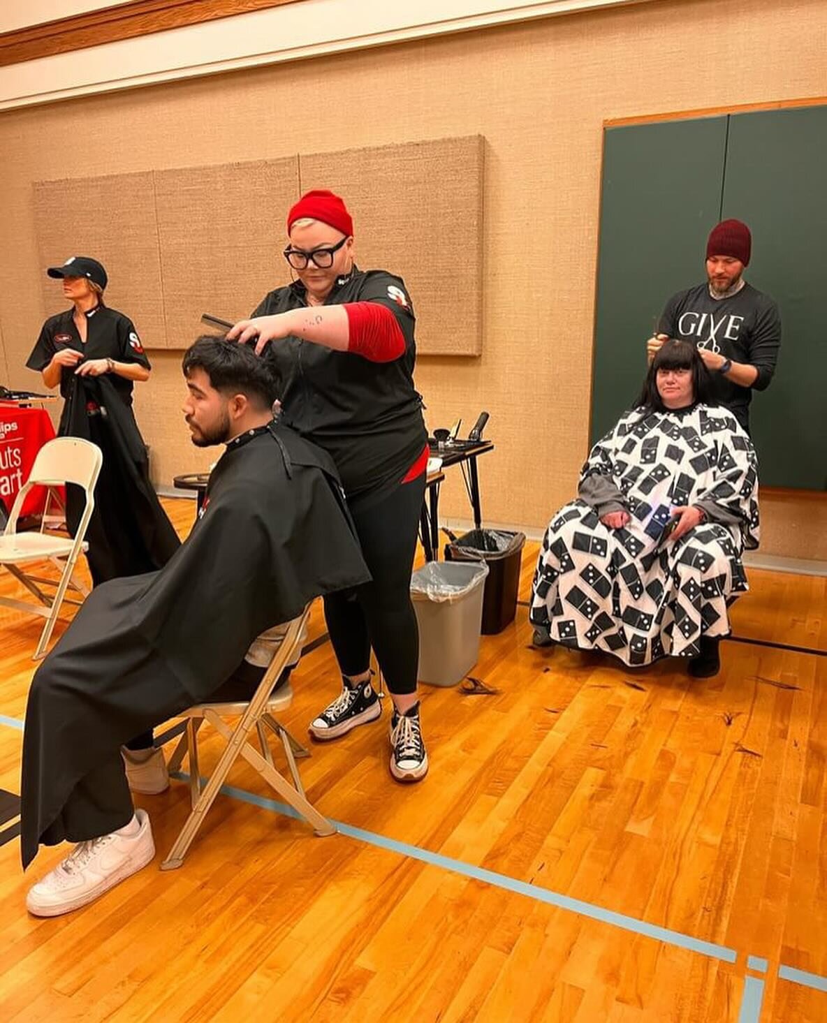 Mykal, the founder of Hairstylists for Humanity, collaborated with a dedicated team of 4 incredible barbers from Sport Clips. Their joint effort resulted in providing 69 haircuts to individuals in need during a compassionate giveback event organized 