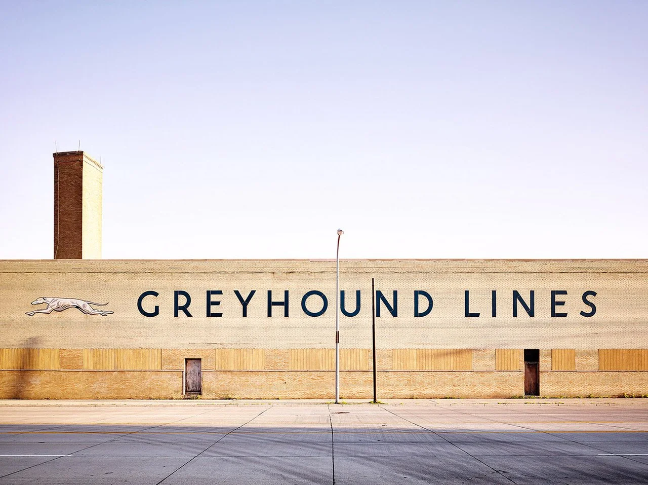 Philip Jarmain. Greyhound Lines, 2015, Ed. 7/10. Archival Pigment Print (White Wood Frame, UV Laminate). 31 x 41.25 x 2 inches framed. Copyright Philip Jarmain courtesy of Jennifer Kostuik Gallery.