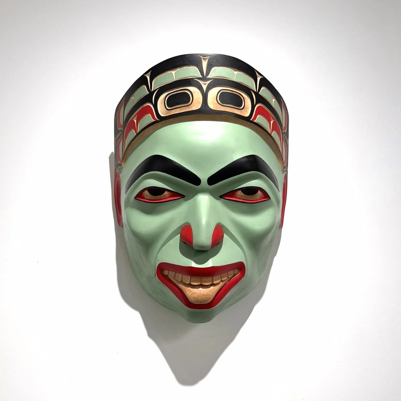 Cole Speck. Shaman Mask, 2025. Alder and acrylic paint. 16 1/2 x 13 x 9 inches. Fazakas Gallery. Photo by Byron Dauncey. 