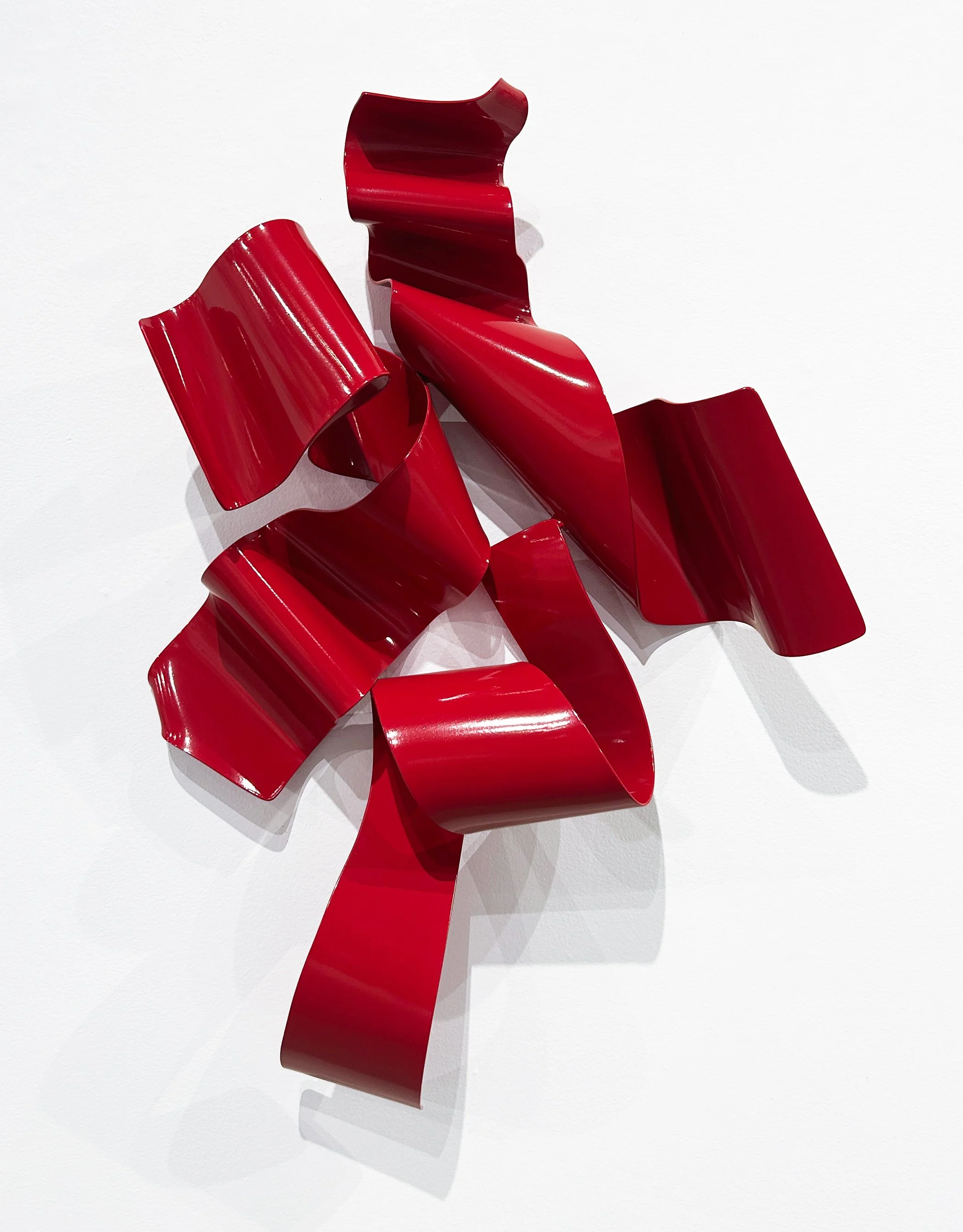 Stefan Duerst. Soul Gate #105, 2020. Hot Formed Steel with Glossy Powdercoat (wall-mounted sculpture). 32 x 22.5 x 7.75 inches. Copyright Stefan Duerst, courtesy of Jennifer Kostuik Gallery.