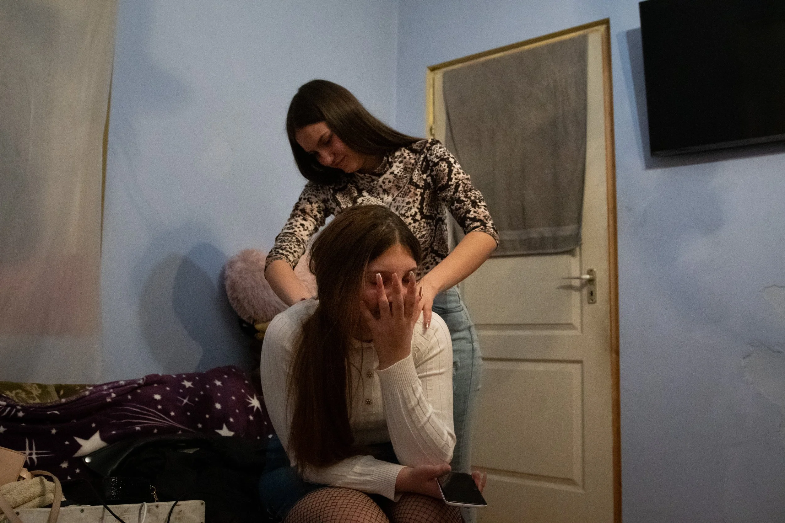  Romani teenagers prepare for a party in their home in Drégelypalánk, Nográd county, Hungary. 