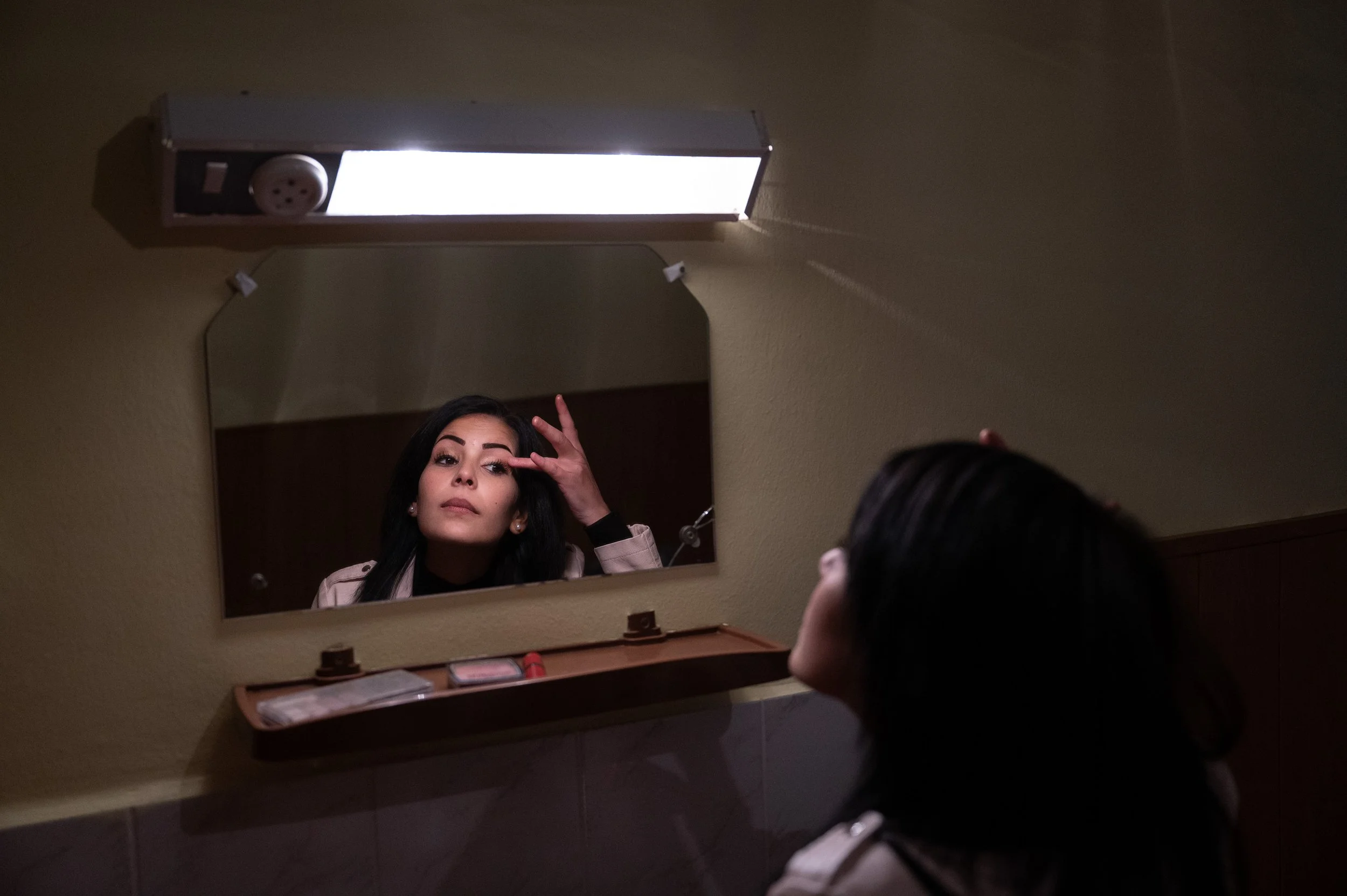  After the evening shift, she freshens up her make-up. Although she rarely goes out anymore, she does most of the shopping. 