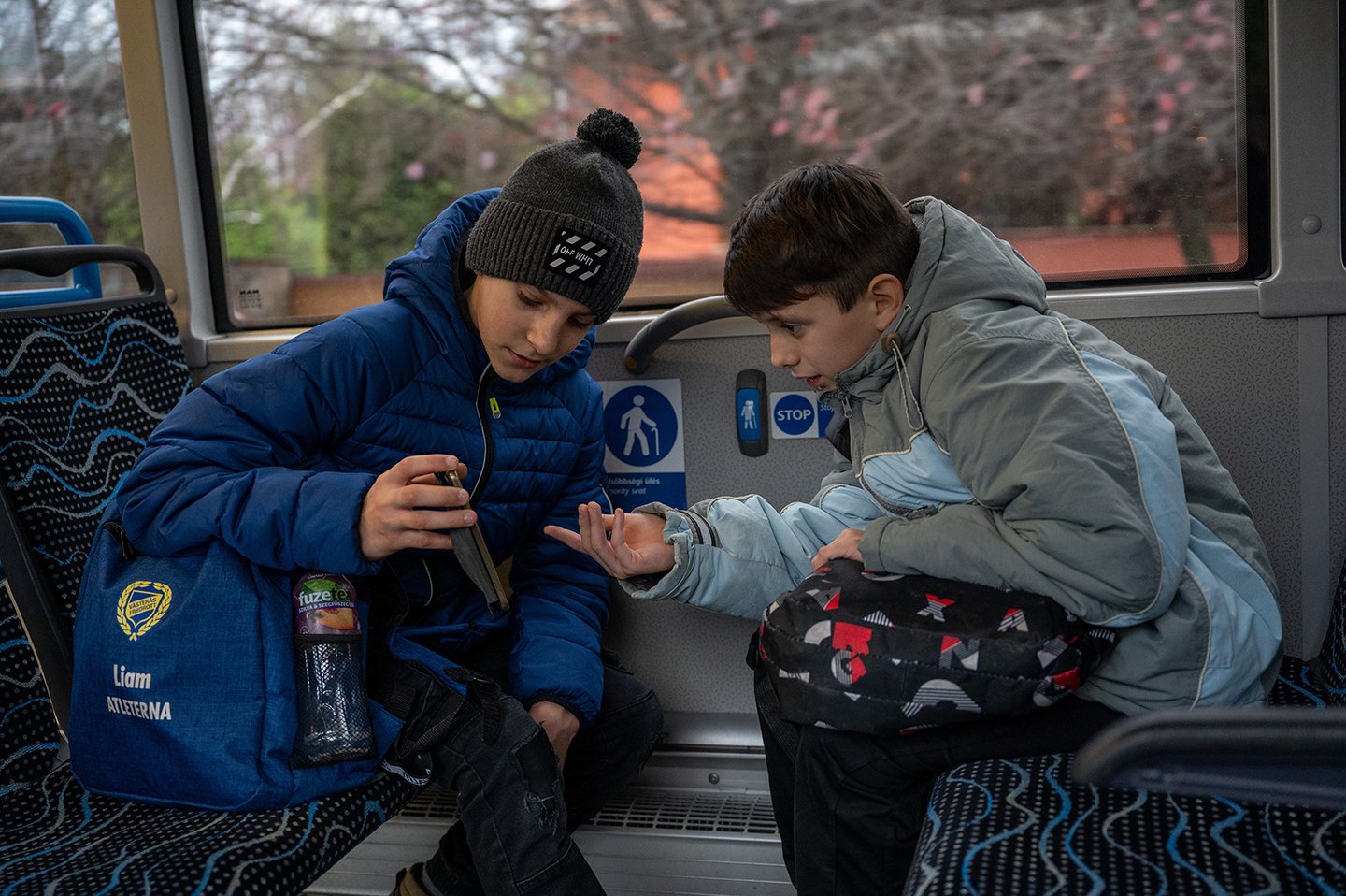 Alex goes home with one of his schoolmates after school.