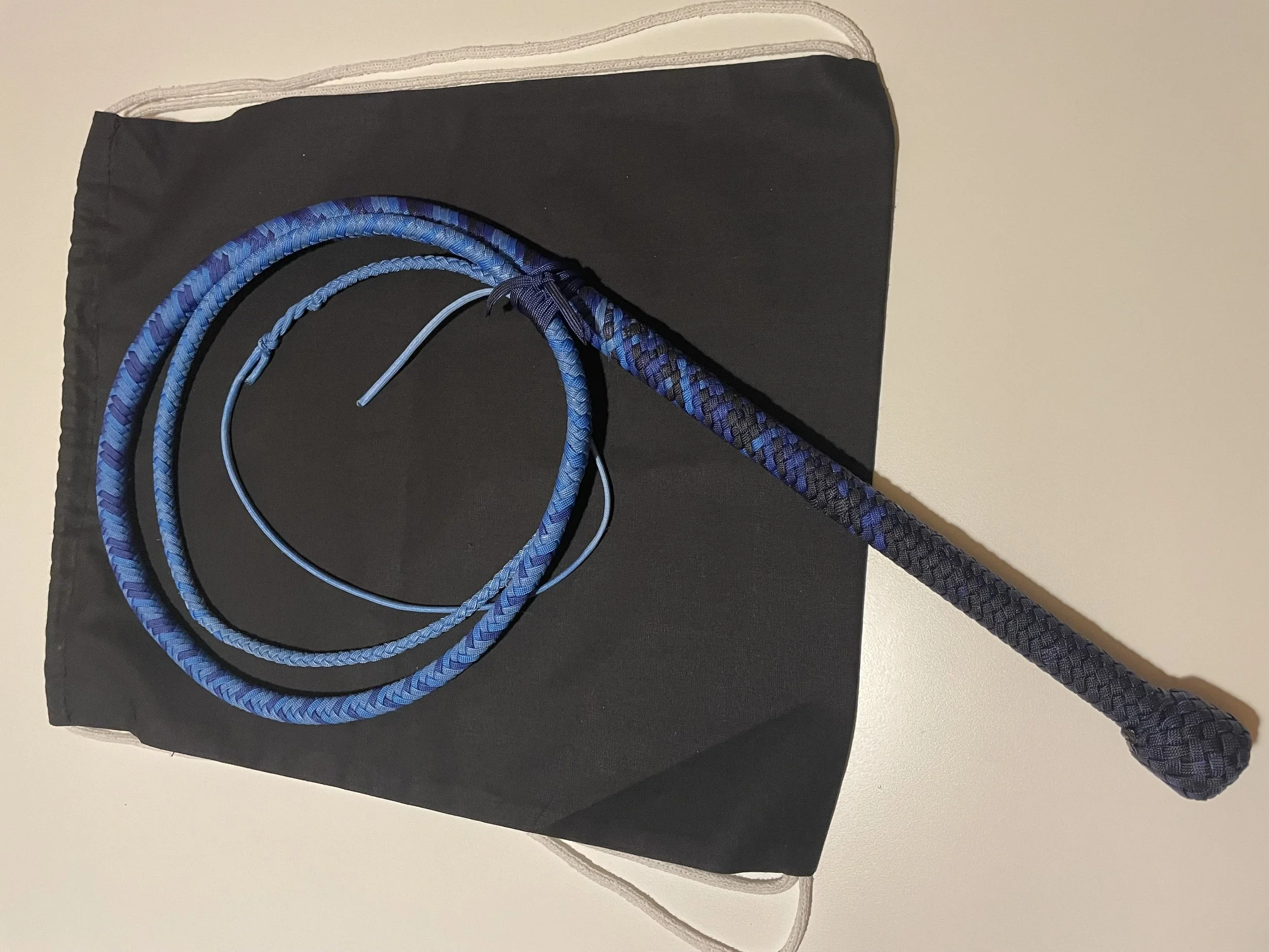 "Neptune"  7fth Ombre Bullwhip - This was my award winning entry into the whip making contest at the 2023 Los Angeles Whip Convention.  This entry placed 2nd only behind Nick Schrader's first place entry. 