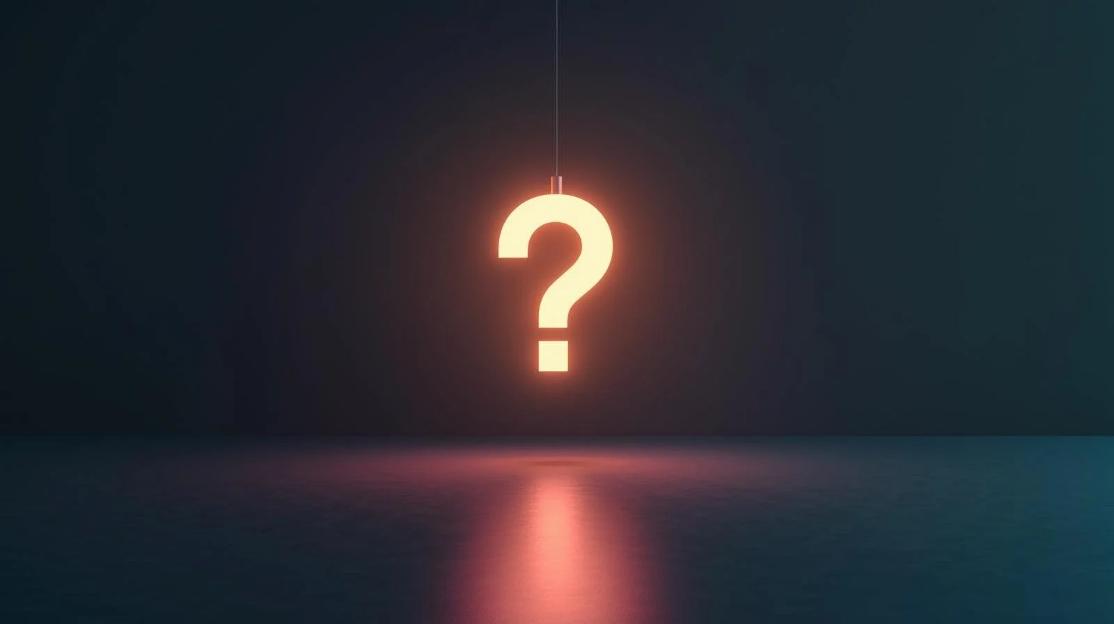 Illuminated question hanging from ceiling representing questions about finding your life path.