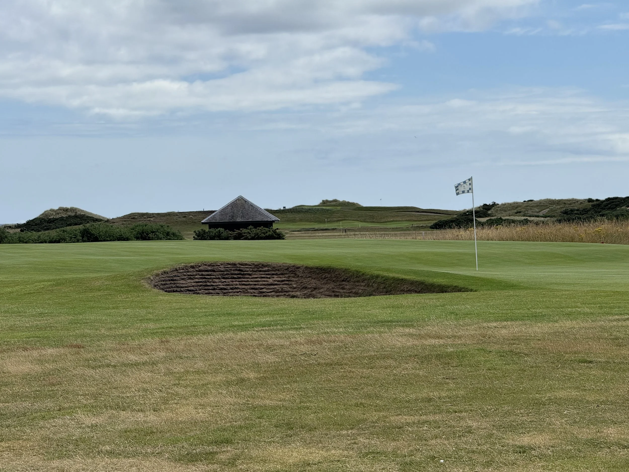 Montrose Golf Links 1562 course bunker green and shelter hut behind