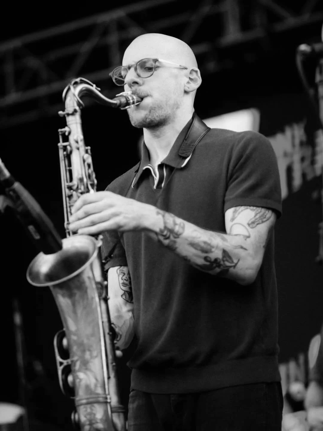 Man playing saxophone on stage