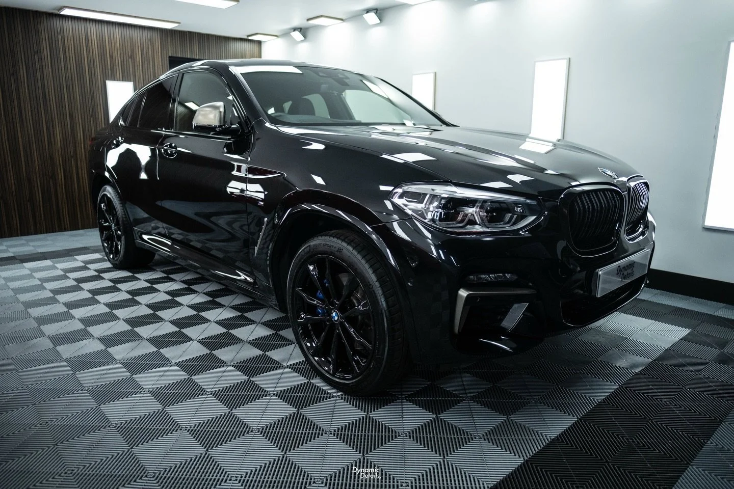 After a stage 2 paint correction, wheel refurbishment, and ceramic coating, this M40 looks like new.