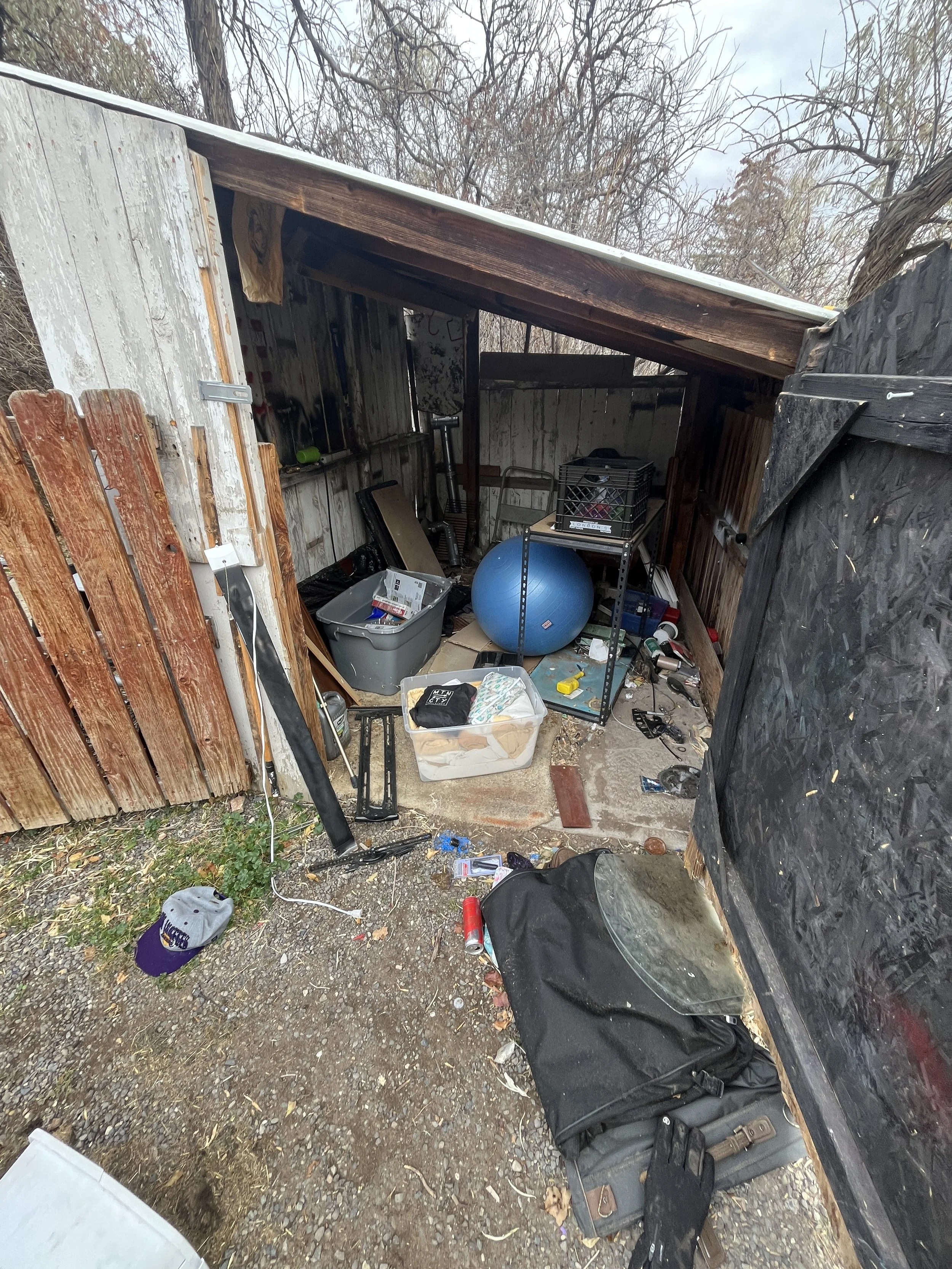 Storage shed that's full of junk being cleaned out in Cody, WY