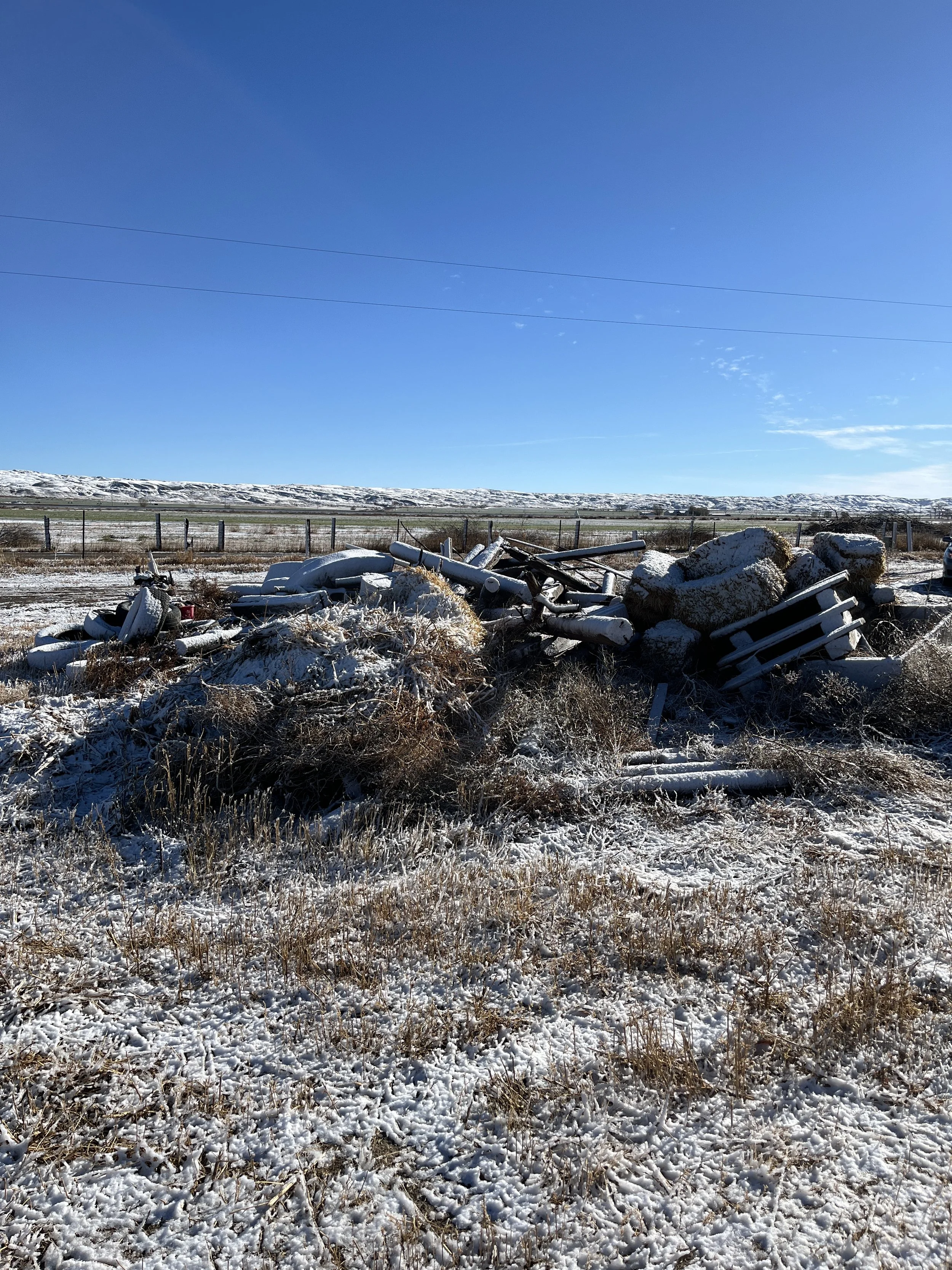 Large debris pile that needs to be removed from property in Burlington, WY
