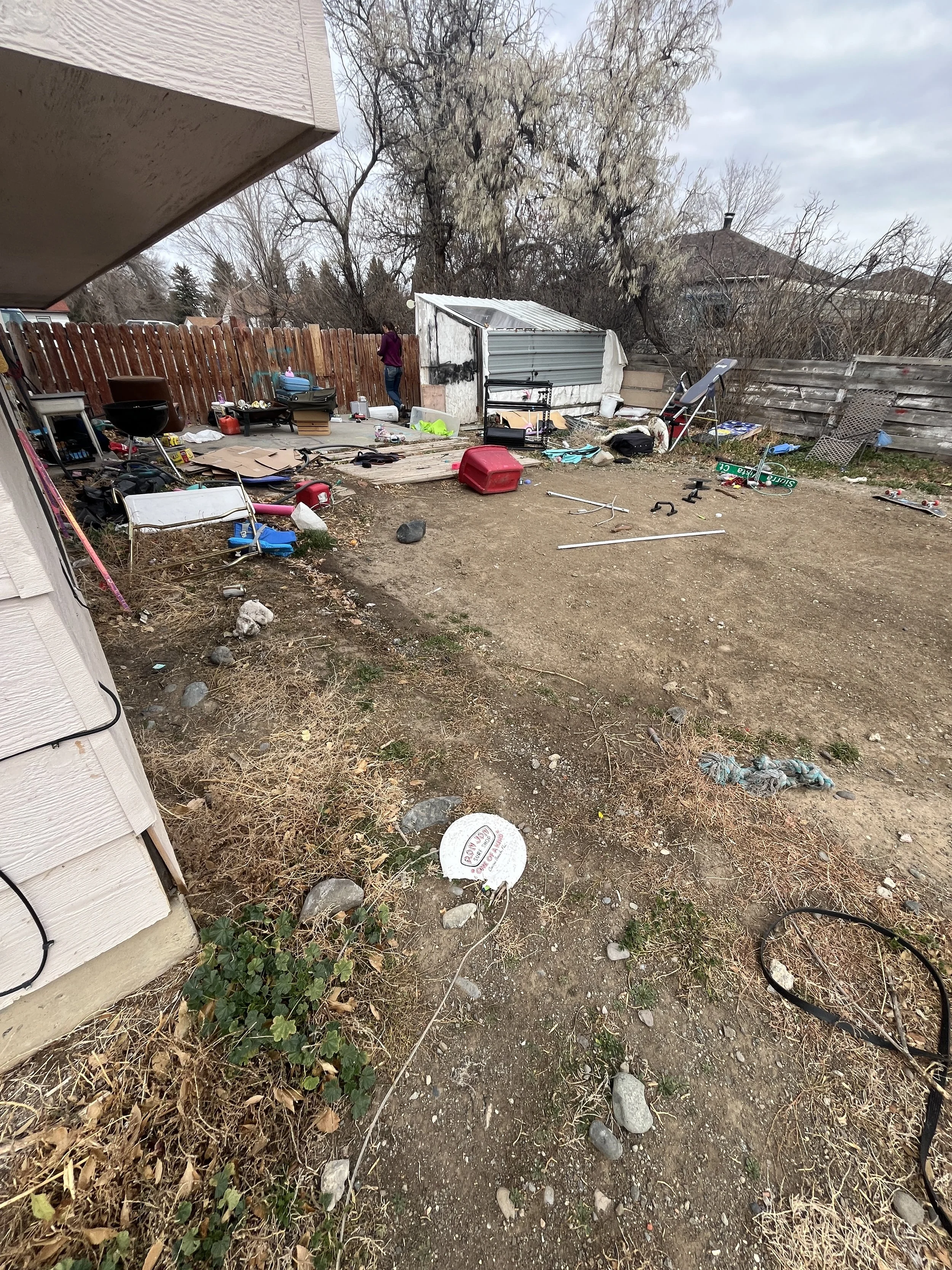 Residential property full of junk thats being cleaned up in Cody, WY