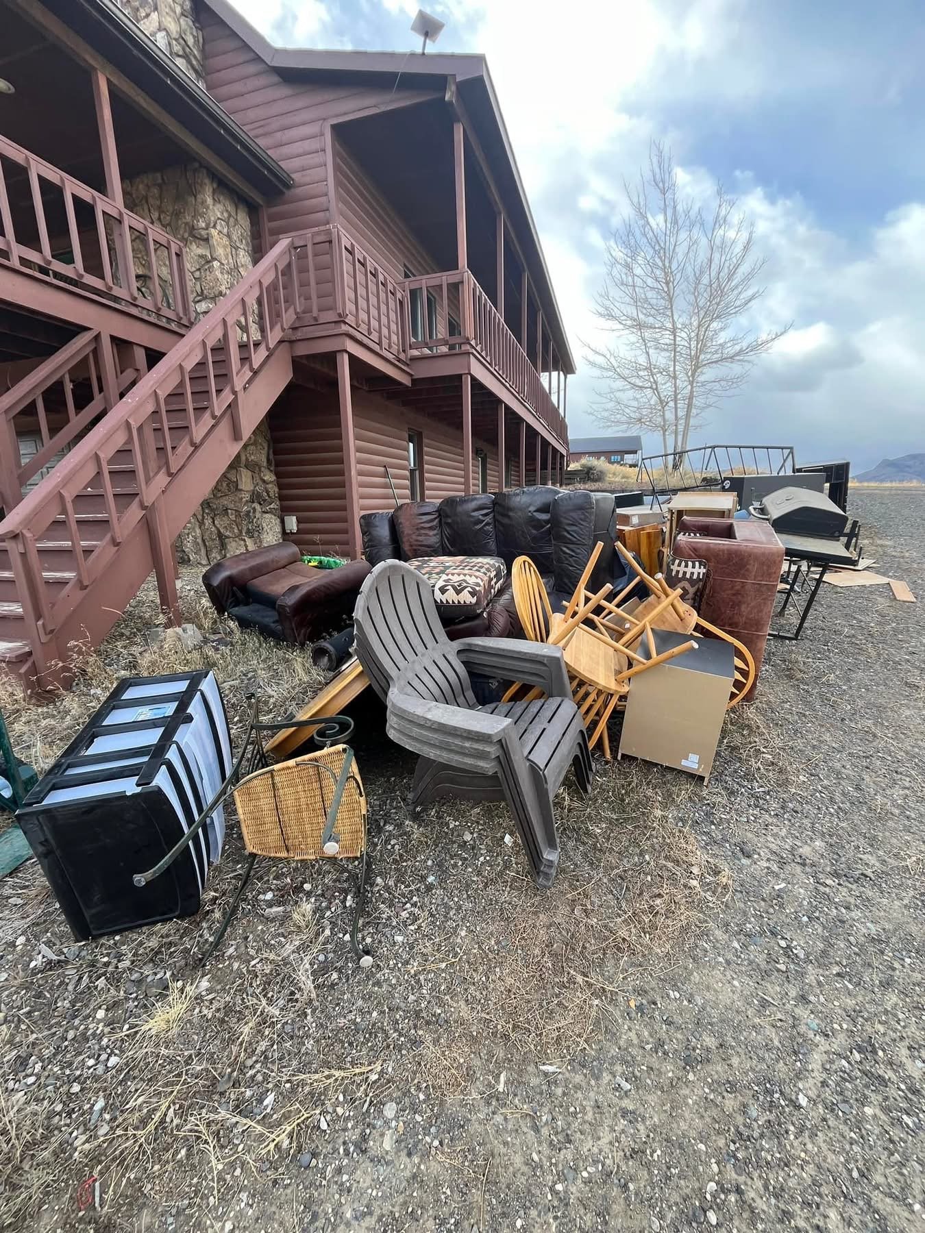 Pile of furniture and junk being removed in Wapati, WY