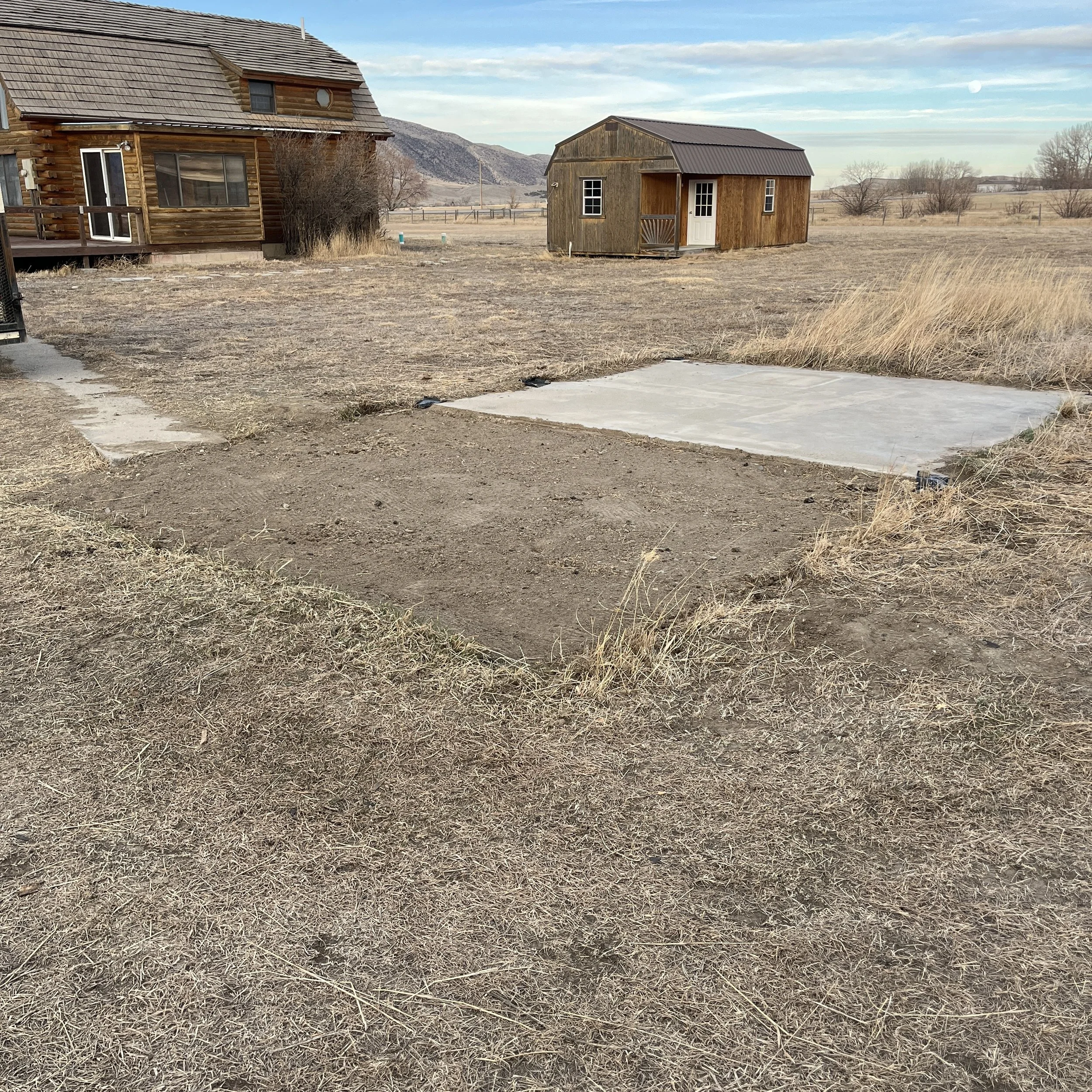 Cleaned up and finished site of a dog kennel and chicken coop in Cody, WY