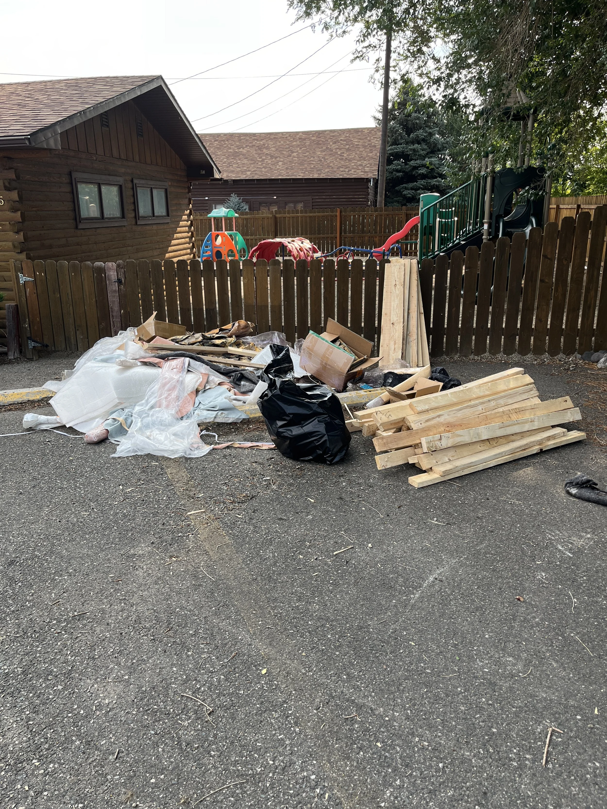 Construction debris pile that needs to be picked up in Cody, Wy