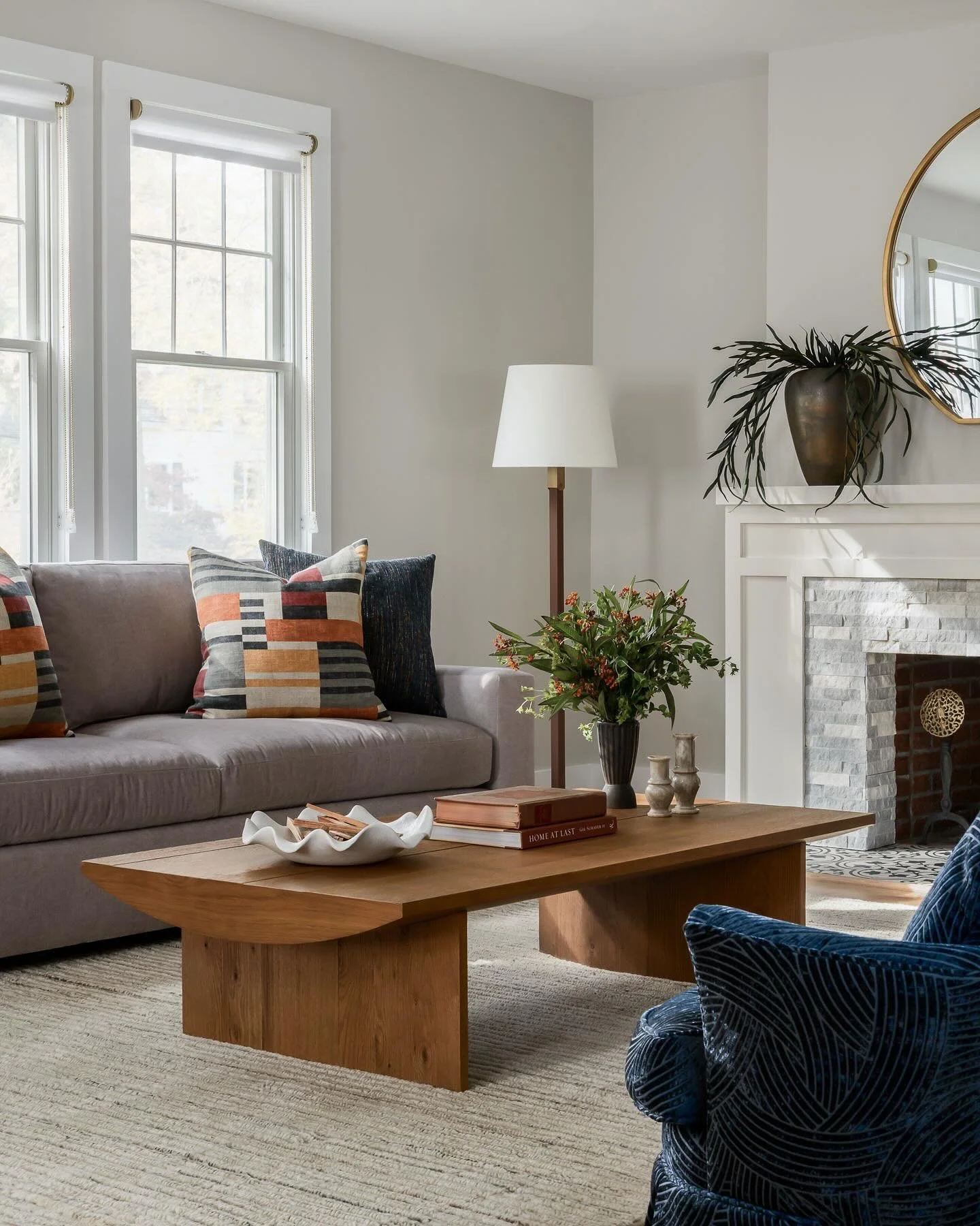 This client had a few meaningful pieces she hoped to incorporate into her living room- especially her grandma&rsquo;s chairs.  While their aesthetic leans earthy modern, these heirloom chairs bring a more traditional feel.  With a thoughtful design e