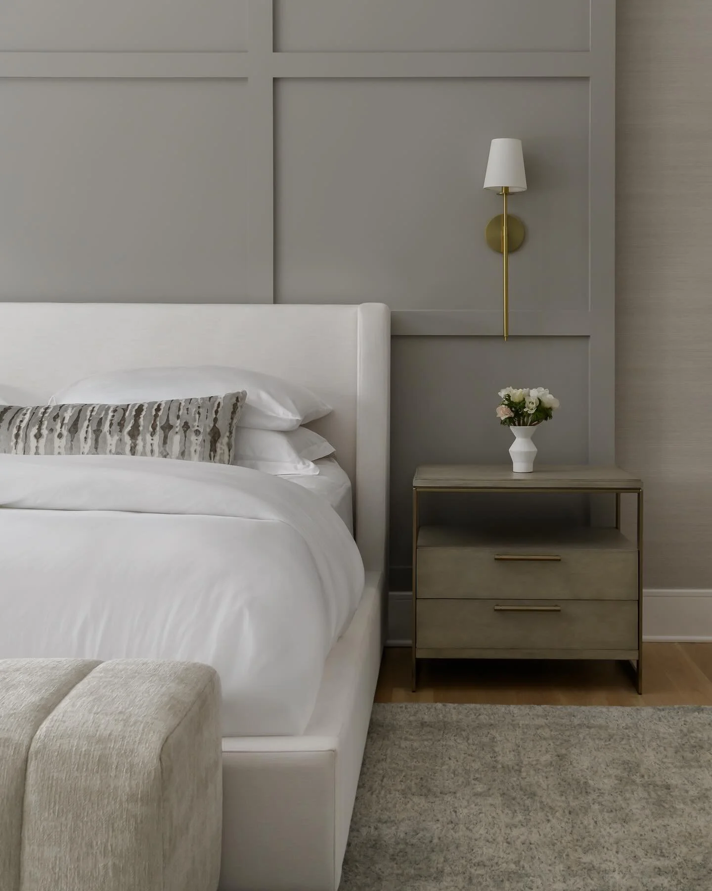Simple isn&rsquo;t the same as empty.  A bedroom done in one warm palette.  A pillow that earns its place through texture, not pattern noise.  A single brass vase on a marble dish.  When the layers are this considered, you don&rsquo;t need more.  You