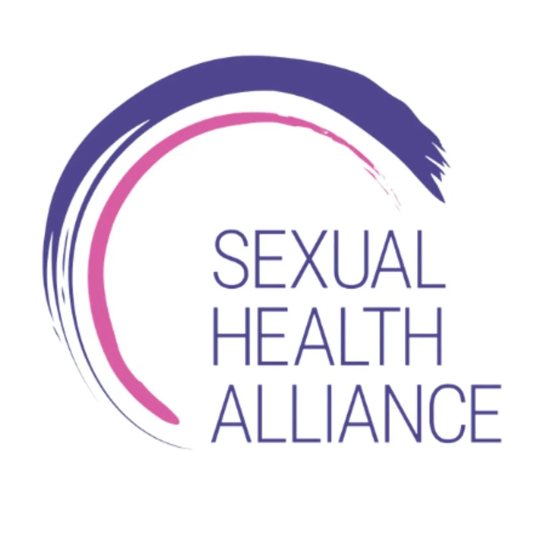 Logo of the Sexual Health Alliance featuring a curved brushstroke design in purple and pink, with the organization's name in purple text.